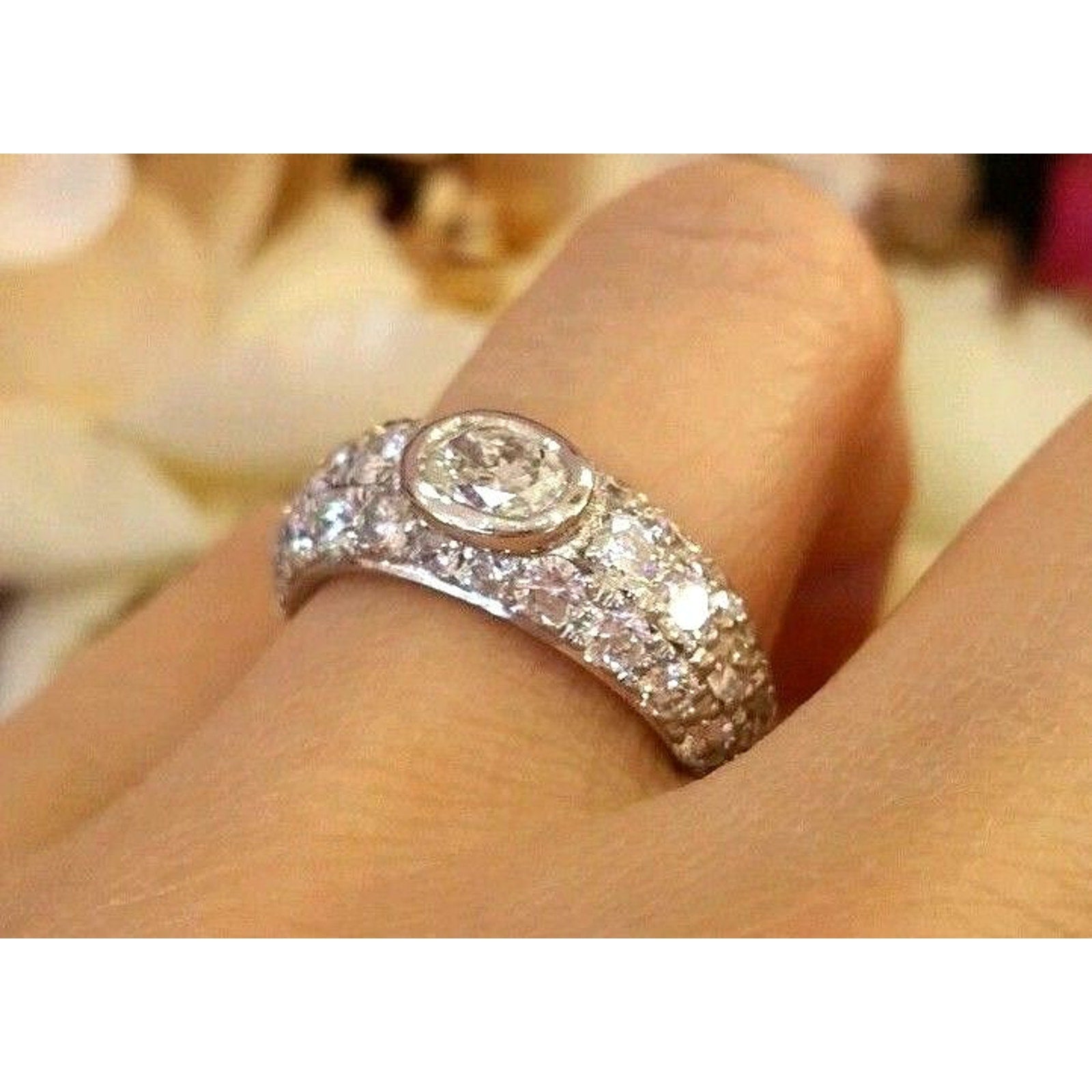 2.40 ct Oval Diamond and Pave Diamond Band in Platinum
