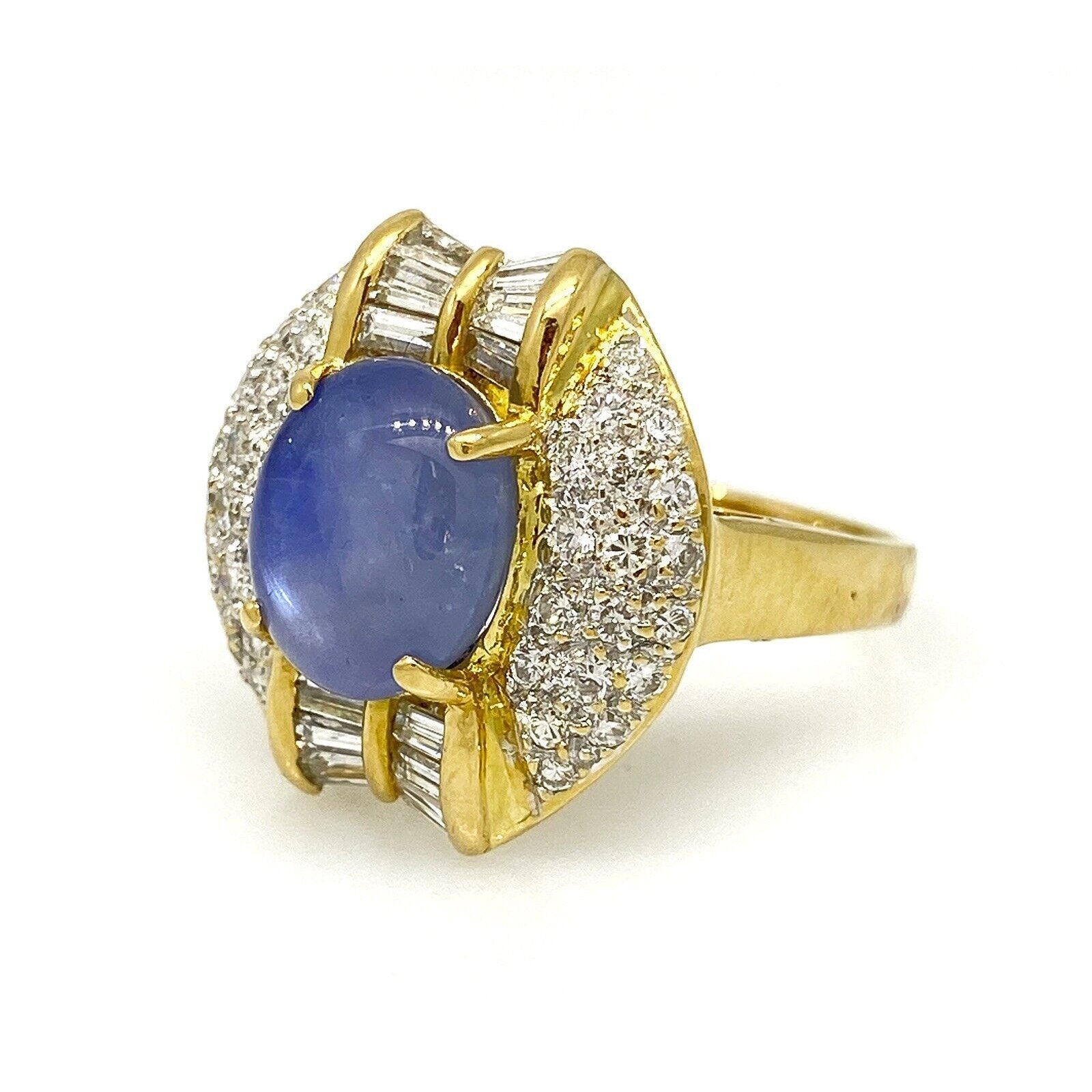 6.24 carat Oval Star Sapphire with Pave Diamonds in 18k Yellow Gold