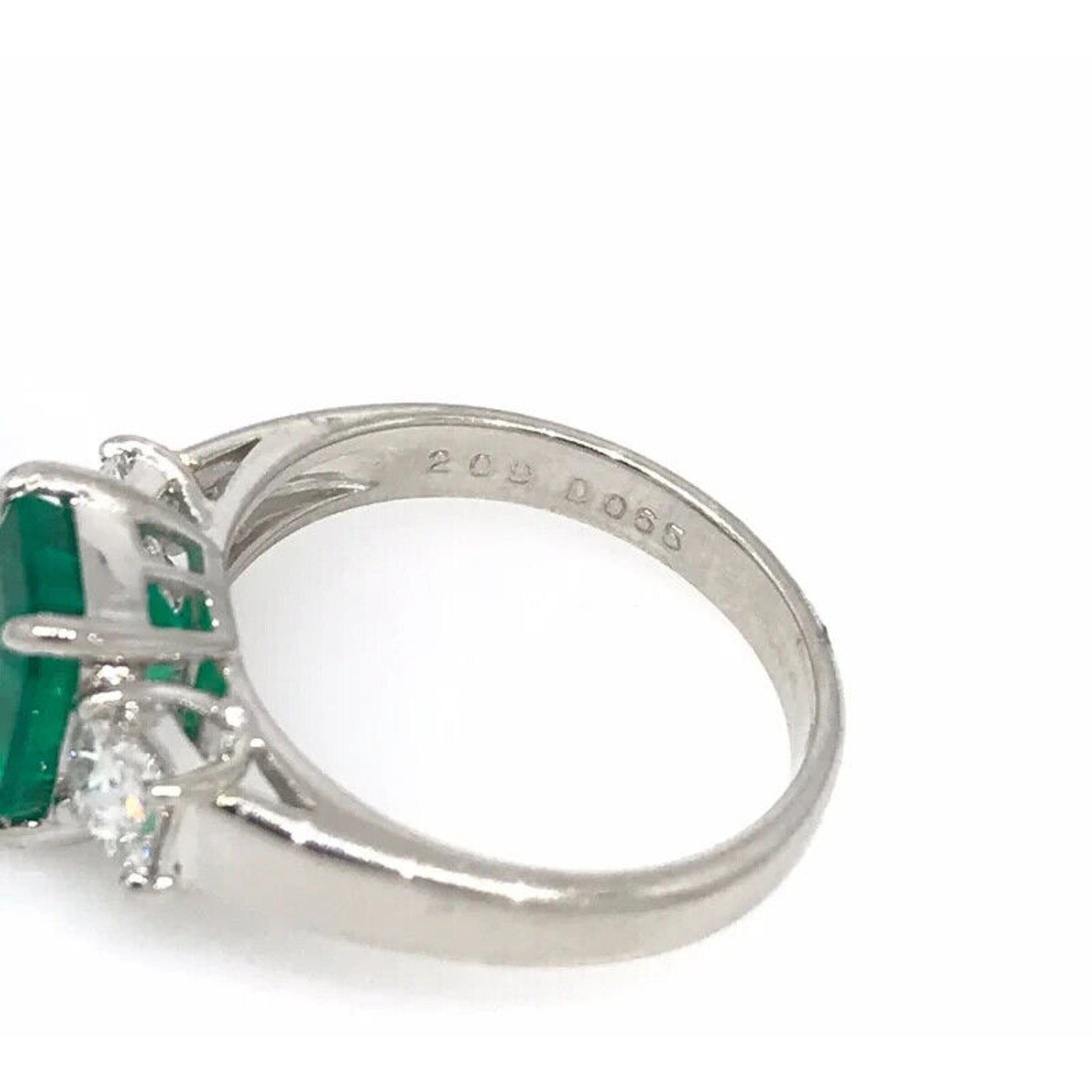 GIA Colombian Emerald and Diamond Three Stone Ring in Platinum