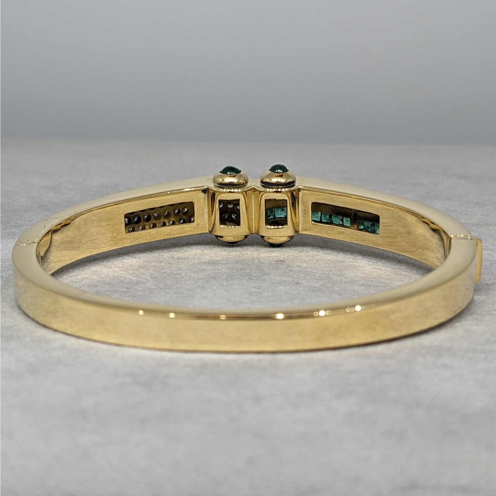 Emerald and Diamond Hinged Bangle Bracelet in 18k Yellow Gold