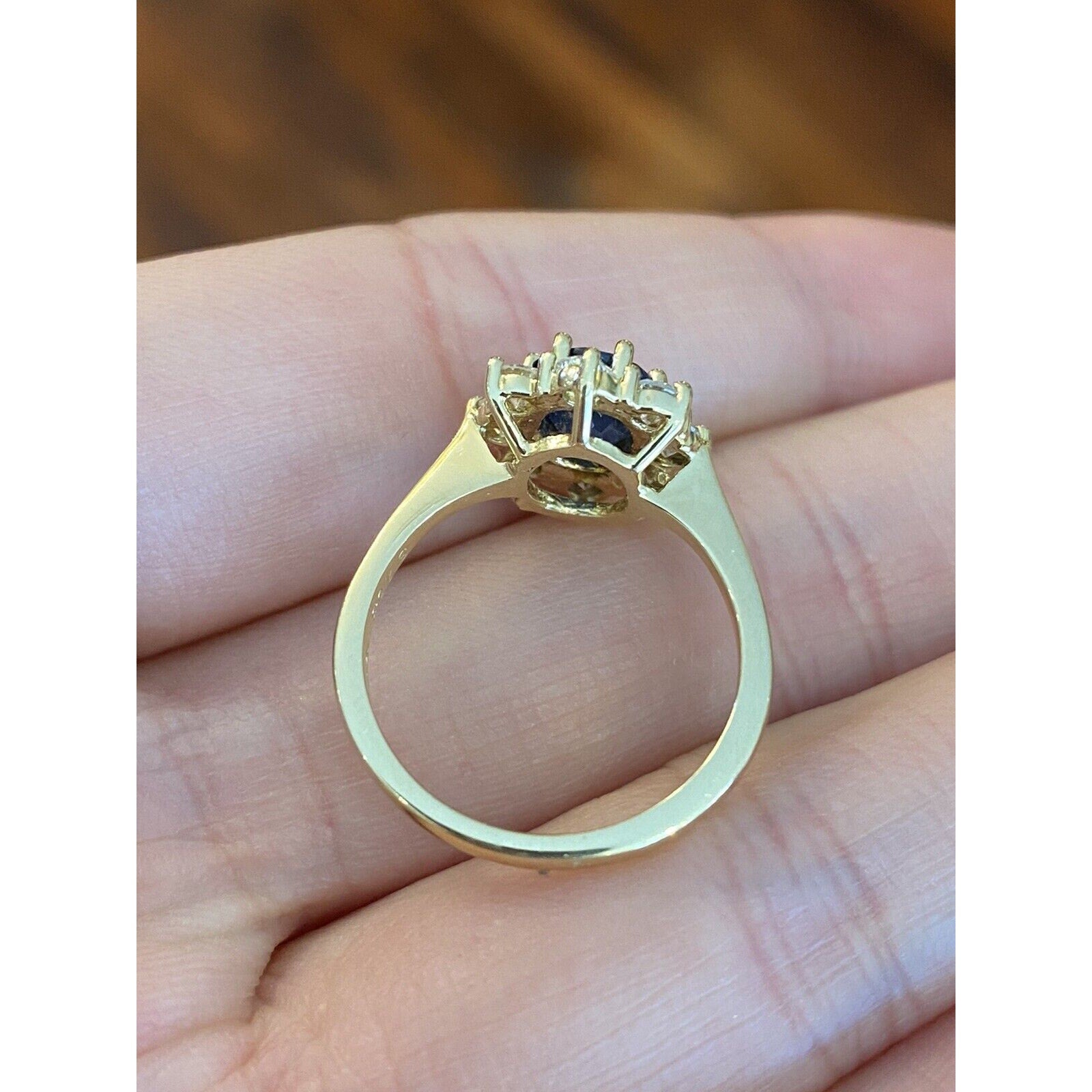 1.63 carat Oval Sapphire and Diamond Halo Ring in 18k Yellow Gold