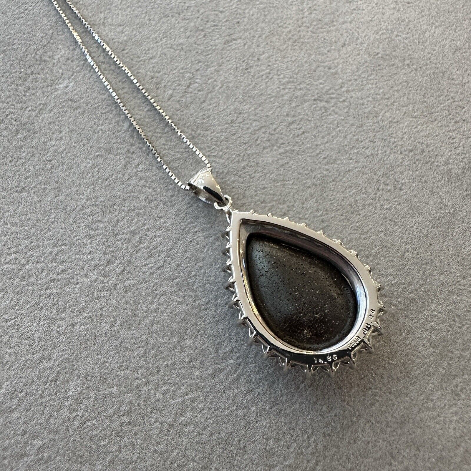 Pear-shaped Boulder Opal and Diamond Pendant Necklace in Platinum