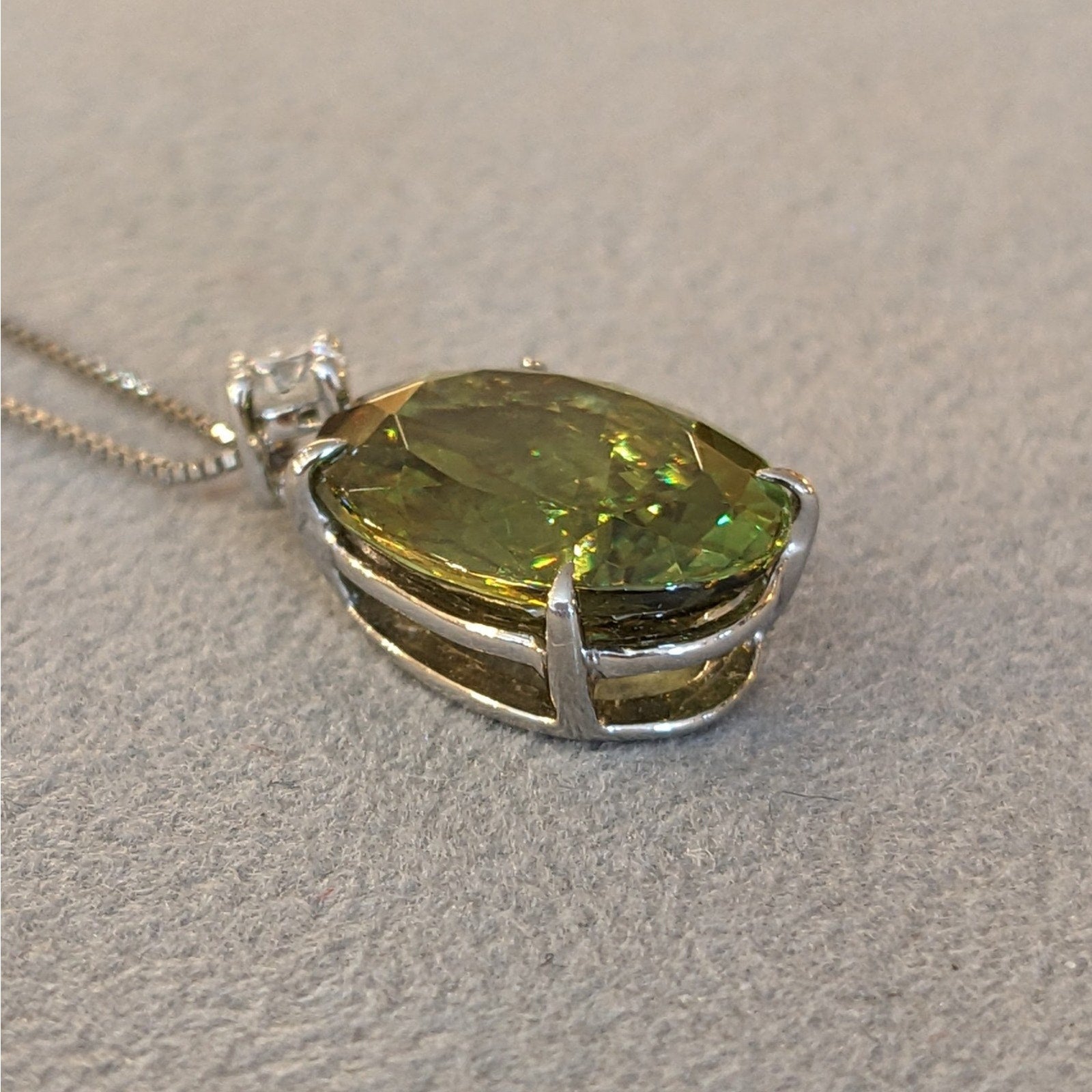 5.69 ct Oval Sphene and Round Diamond Pendant Necklace in Platinum