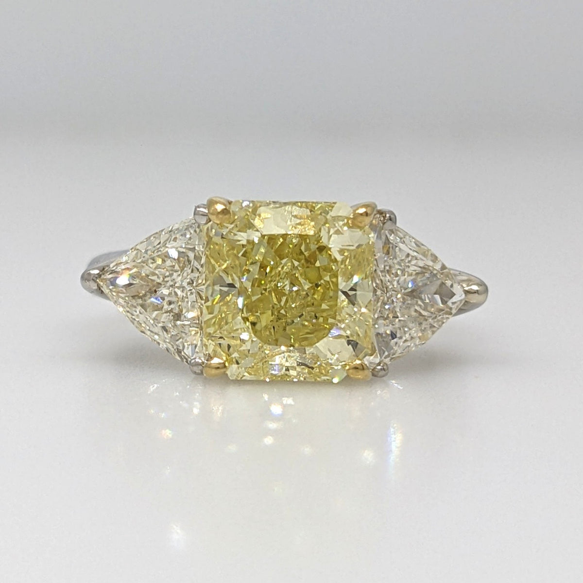 GIA Fancy Yellow Radiant 3.22ct Three-Stone Diamond Ring in Plat/18k