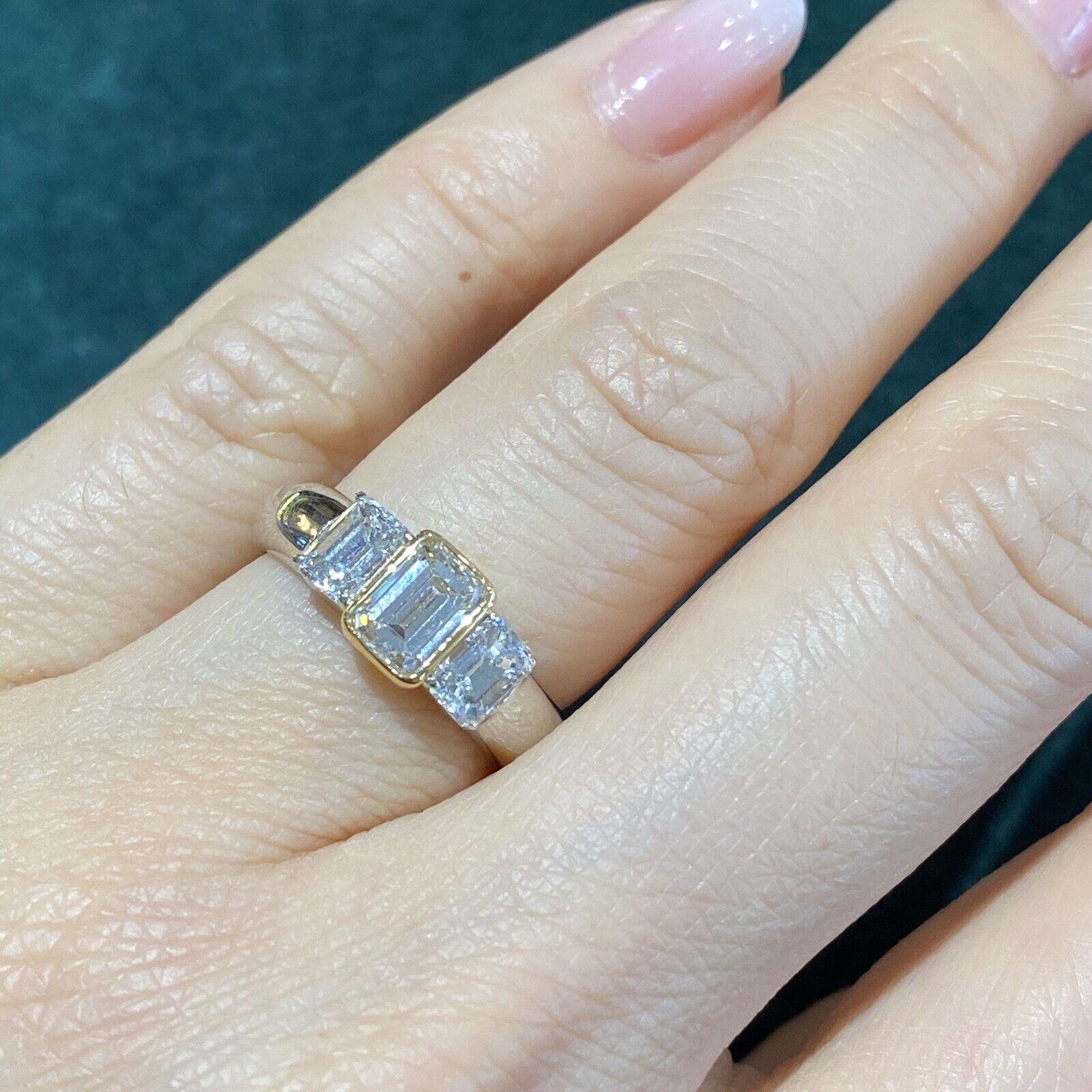 Three Stone Emerald Cut Diamond Ring in Platinum /18k Yellow Gold