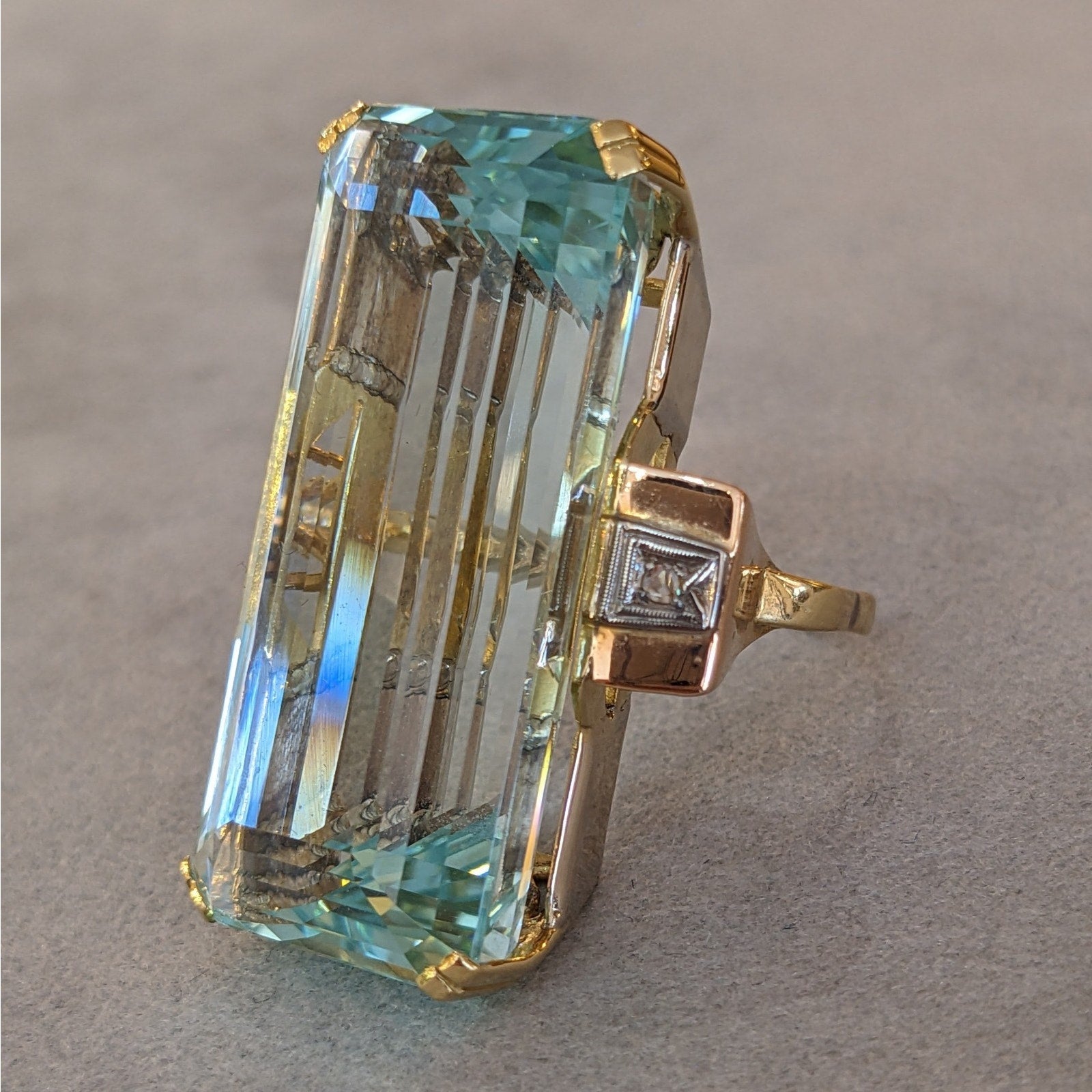 66.92 ct Elongated Aquamarine in Retro ring setting 18k and 14k Gold