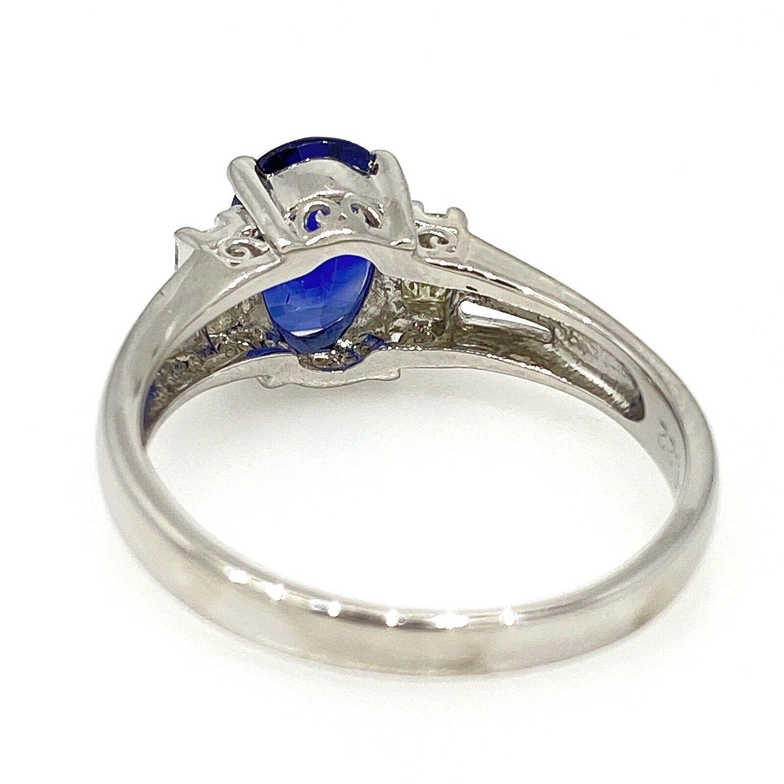 1.17 carat Oval Sapphire and Diamond Three Stone Ring in Platinum