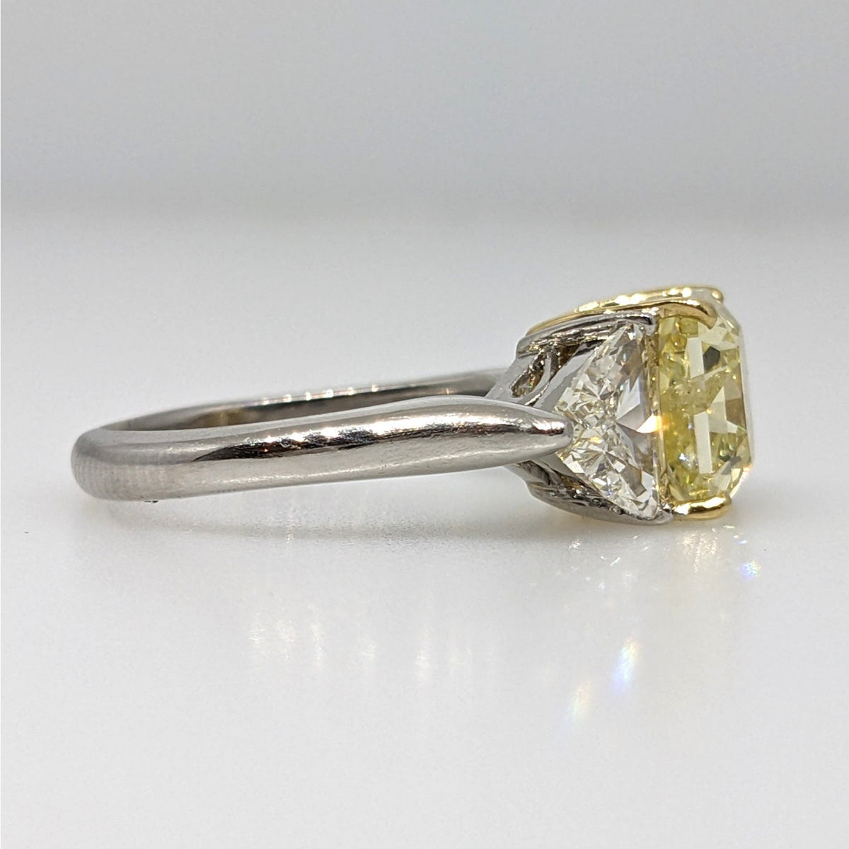 GIA Fancy Yellow Radiant 3.22ct Three-Stone Diamond Ring in Plat/18k