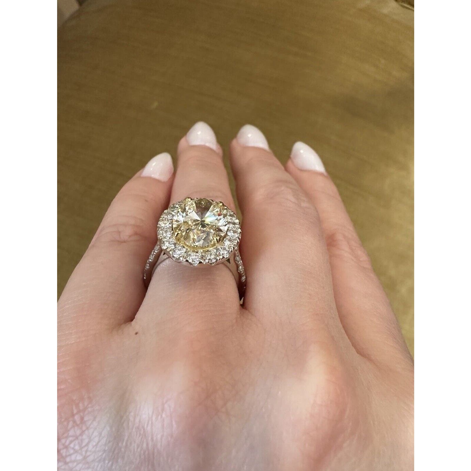 GIA 6.05 carat Oval Brilliant Yellow Diamond Halo Ring in 18k Gold - C300EB
