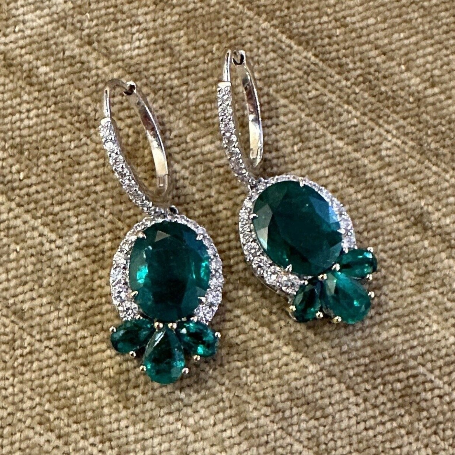 Oval Emerald and Diamond Drop Earrings in 18k White Gold