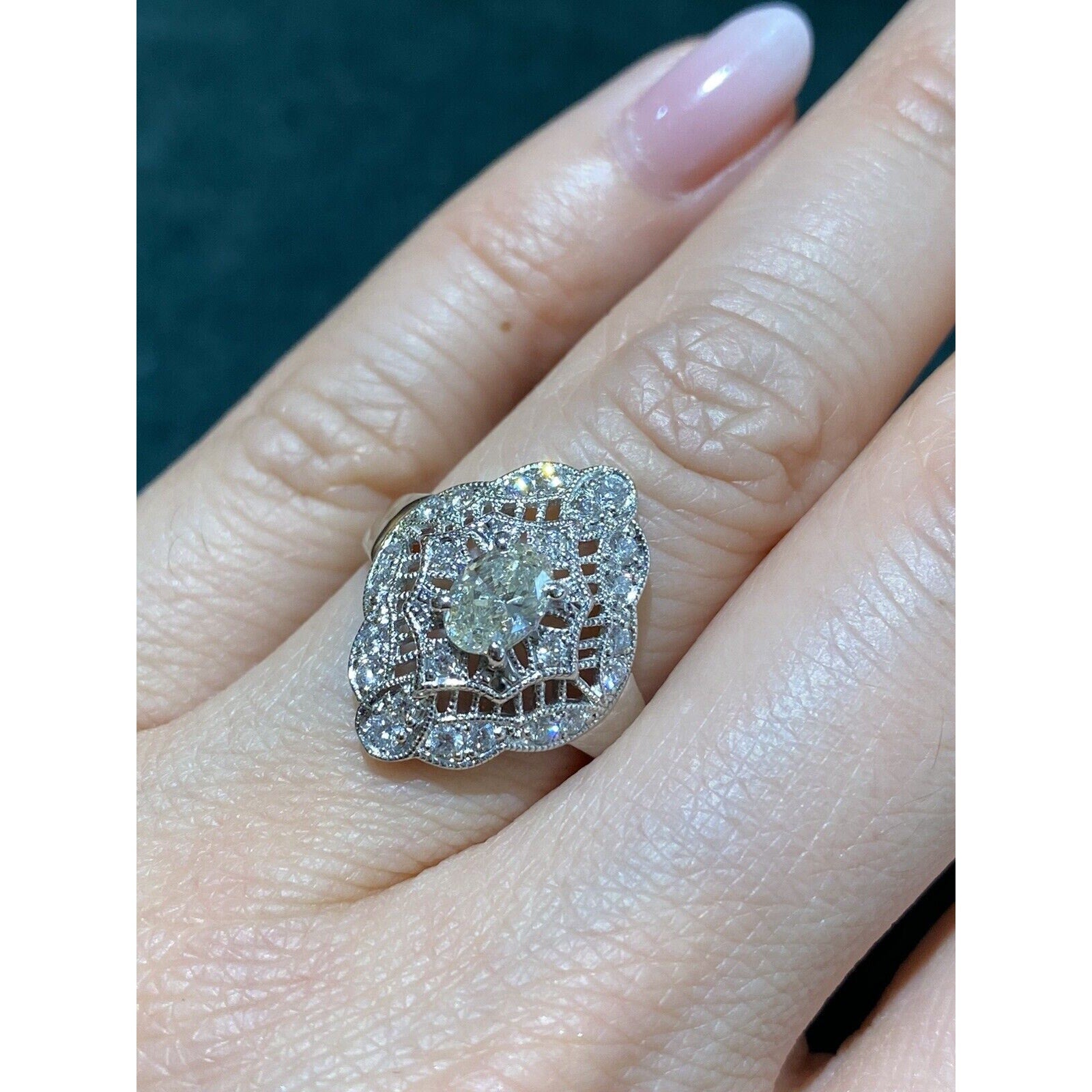 Oval Diamond Navette Shaped Filigree Ring in Platinum