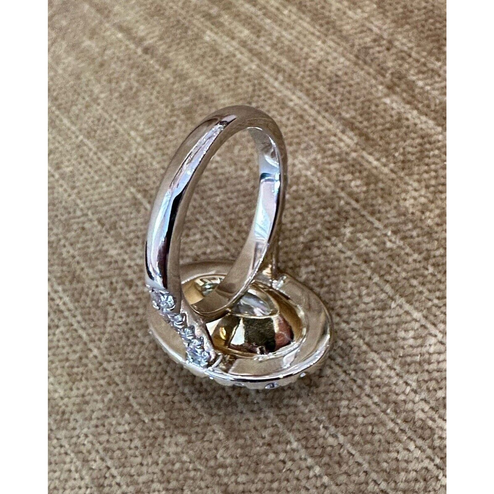 GIA 6.05 carat Oval Brilliant Yellow Diamond Halo Ring in 18k Gold - C300EB