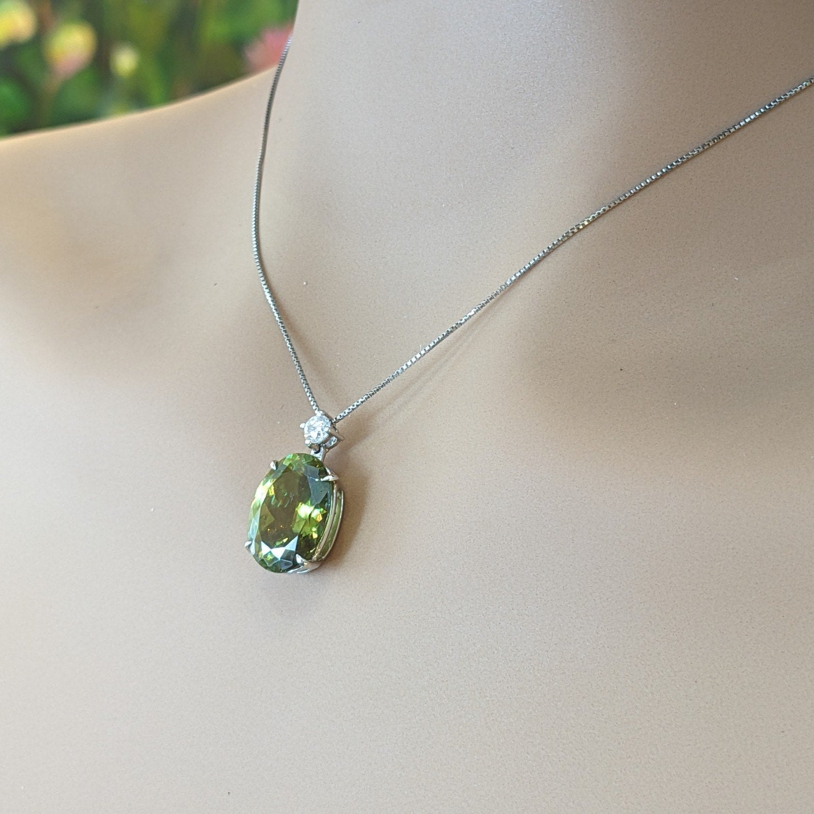 5.69 ct Oval Sphene and Round Diamond Pendant Necklace in Platinum