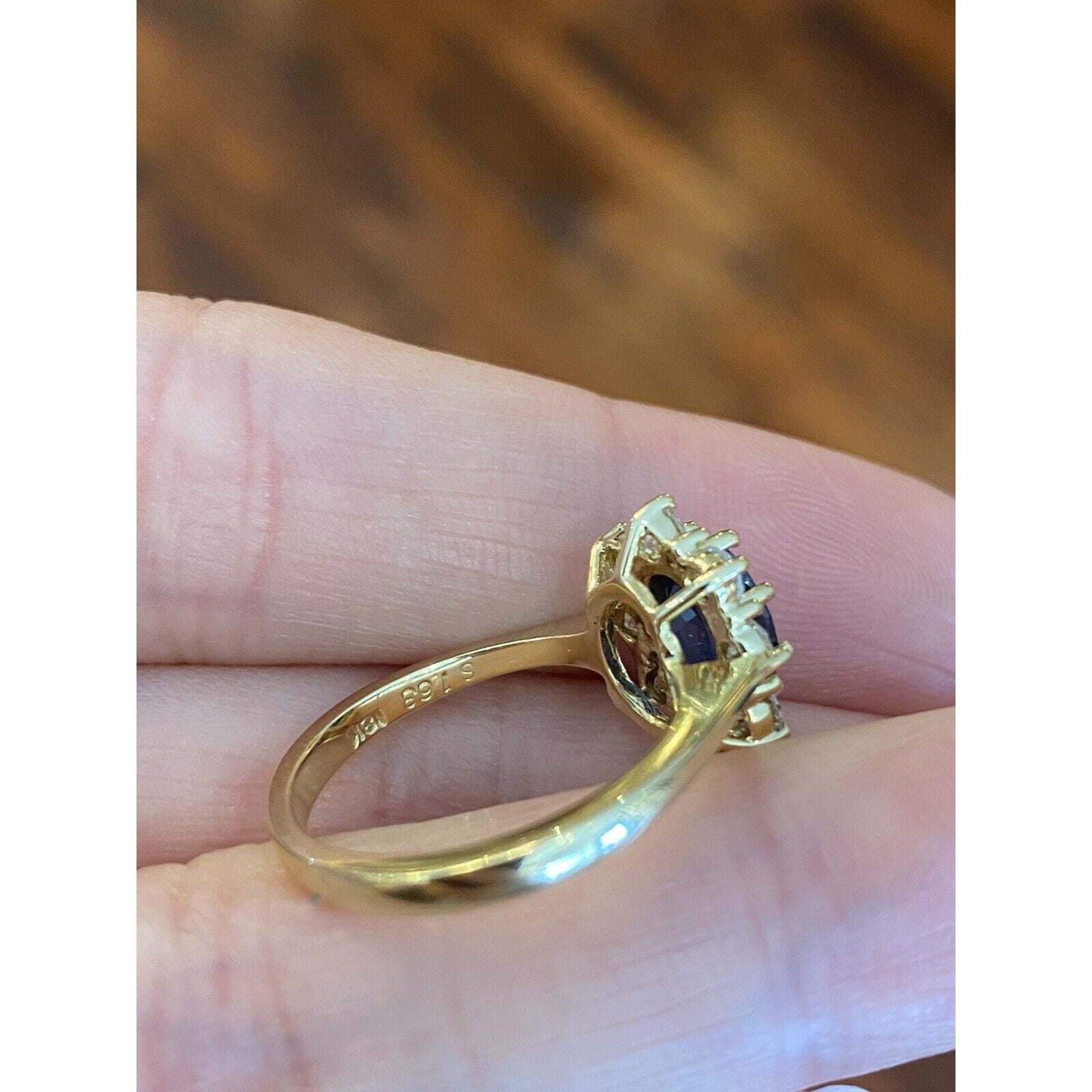 1.63 carat Oval Sapphire and Diamond Halo Ring in 18k Yellow Gold