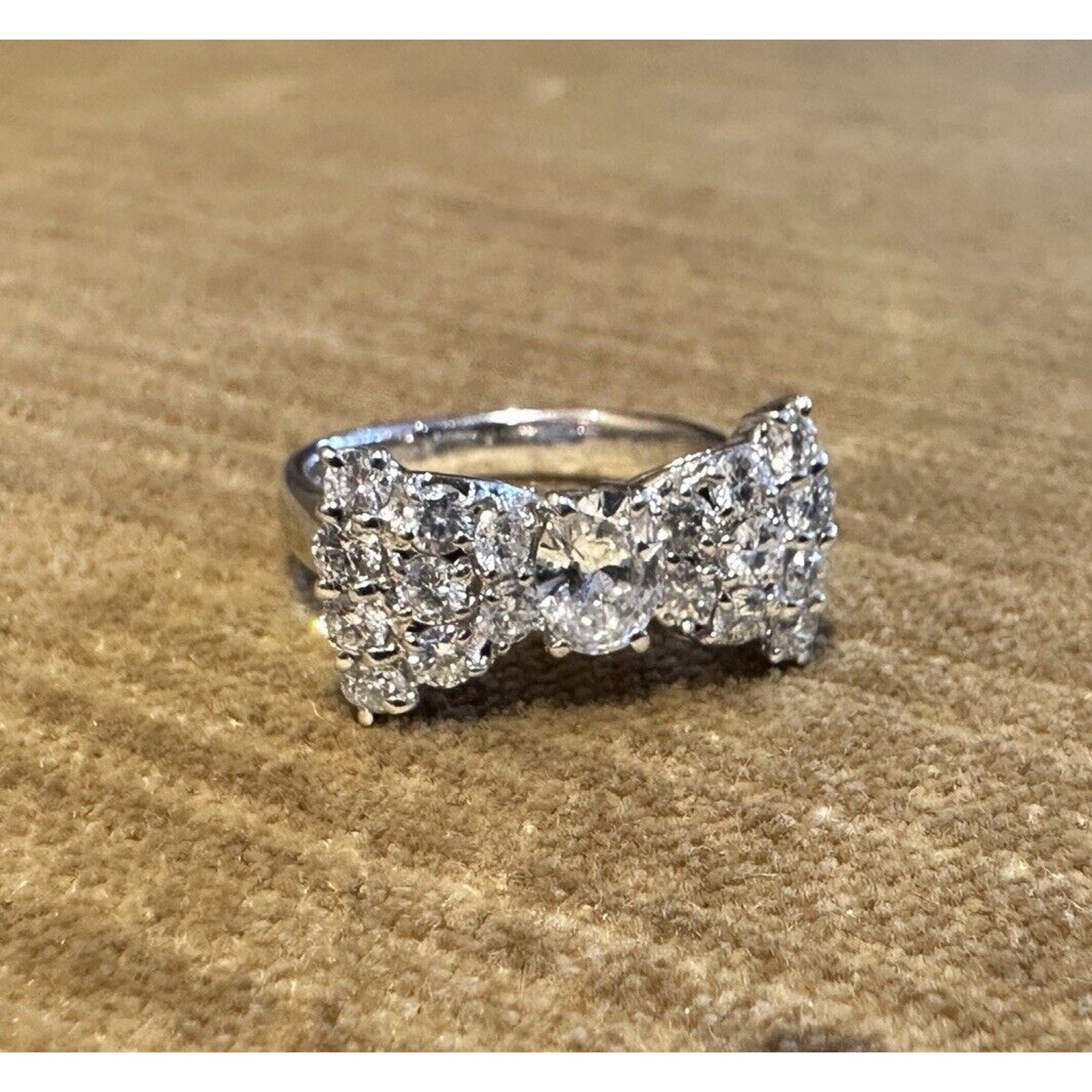 Oval Diamond Center Bow Ring in 18k White Gold