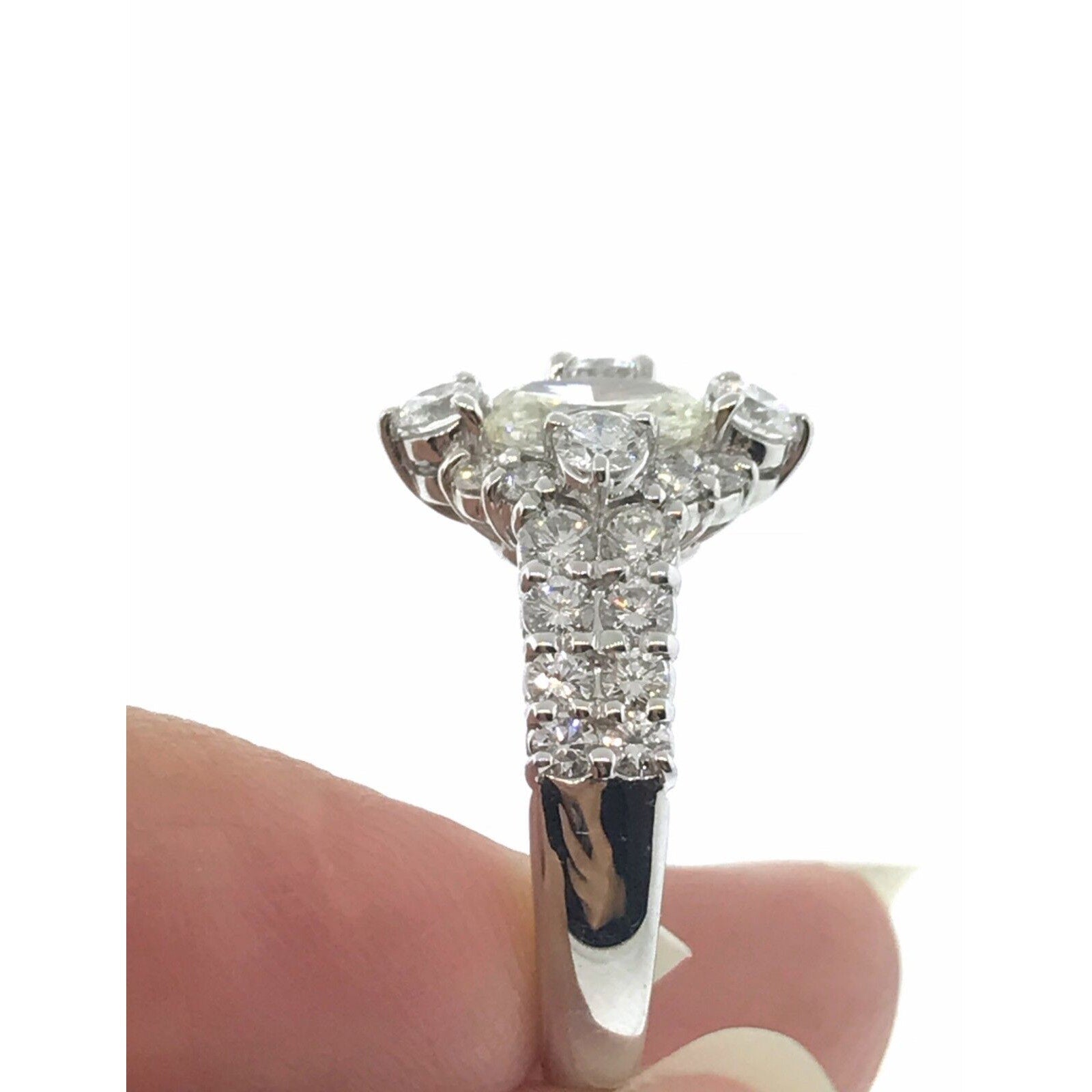 1.00 ct Oval Shaped Diamond in Round Diamond Halo Platinum Ring