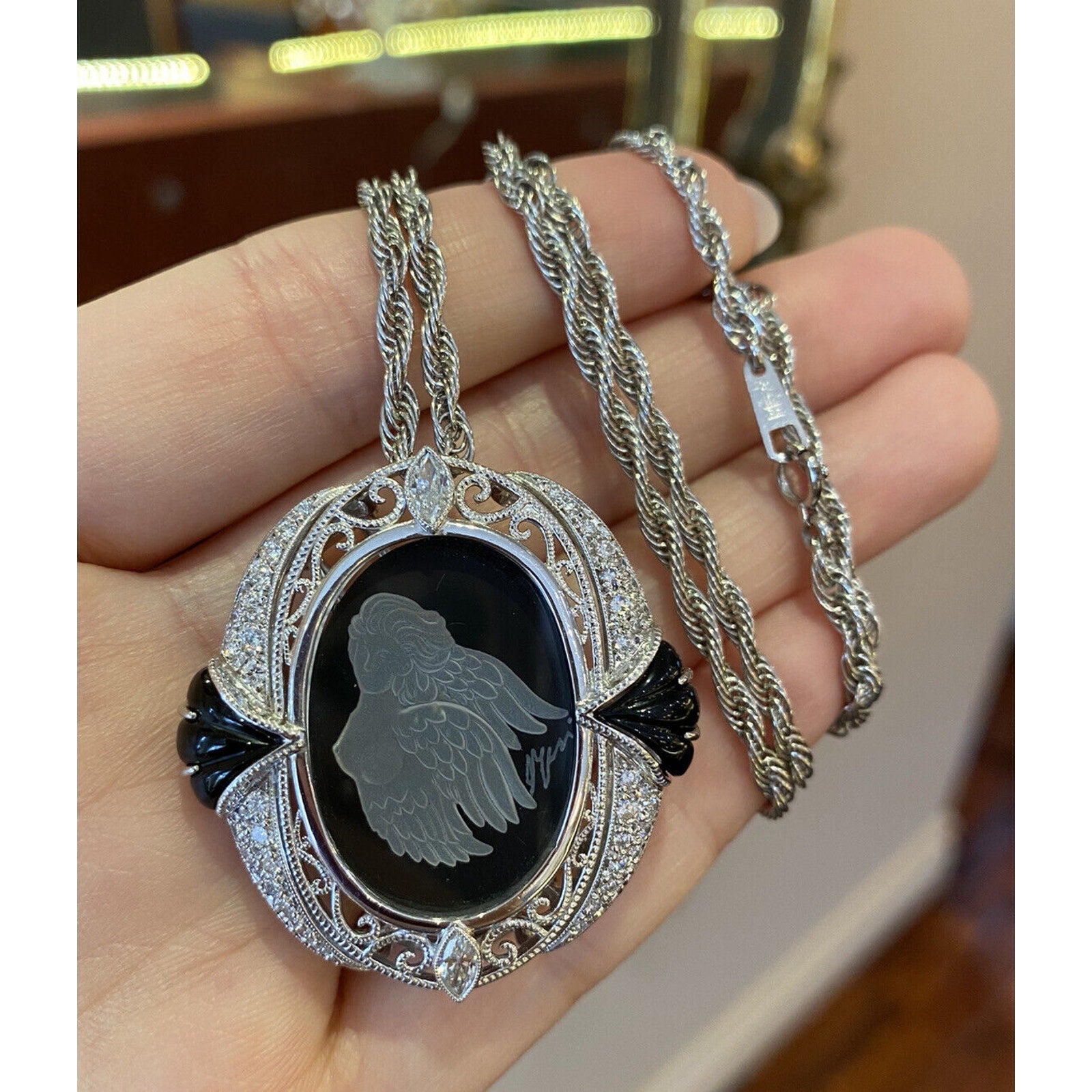 Carved Angel Pendant Brooch Necklace with Diamonds and in Platinum