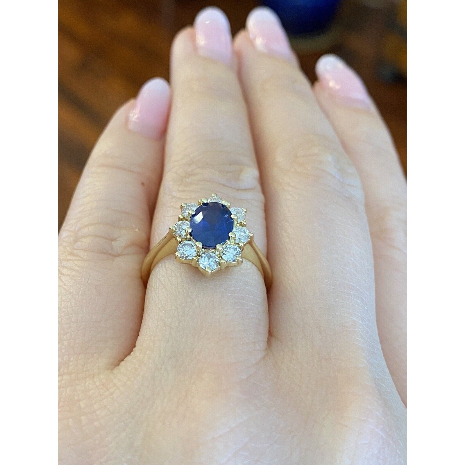 1.63 carat Oval Sapphire and Diamond Halo Ring in 18k Yellow Gold