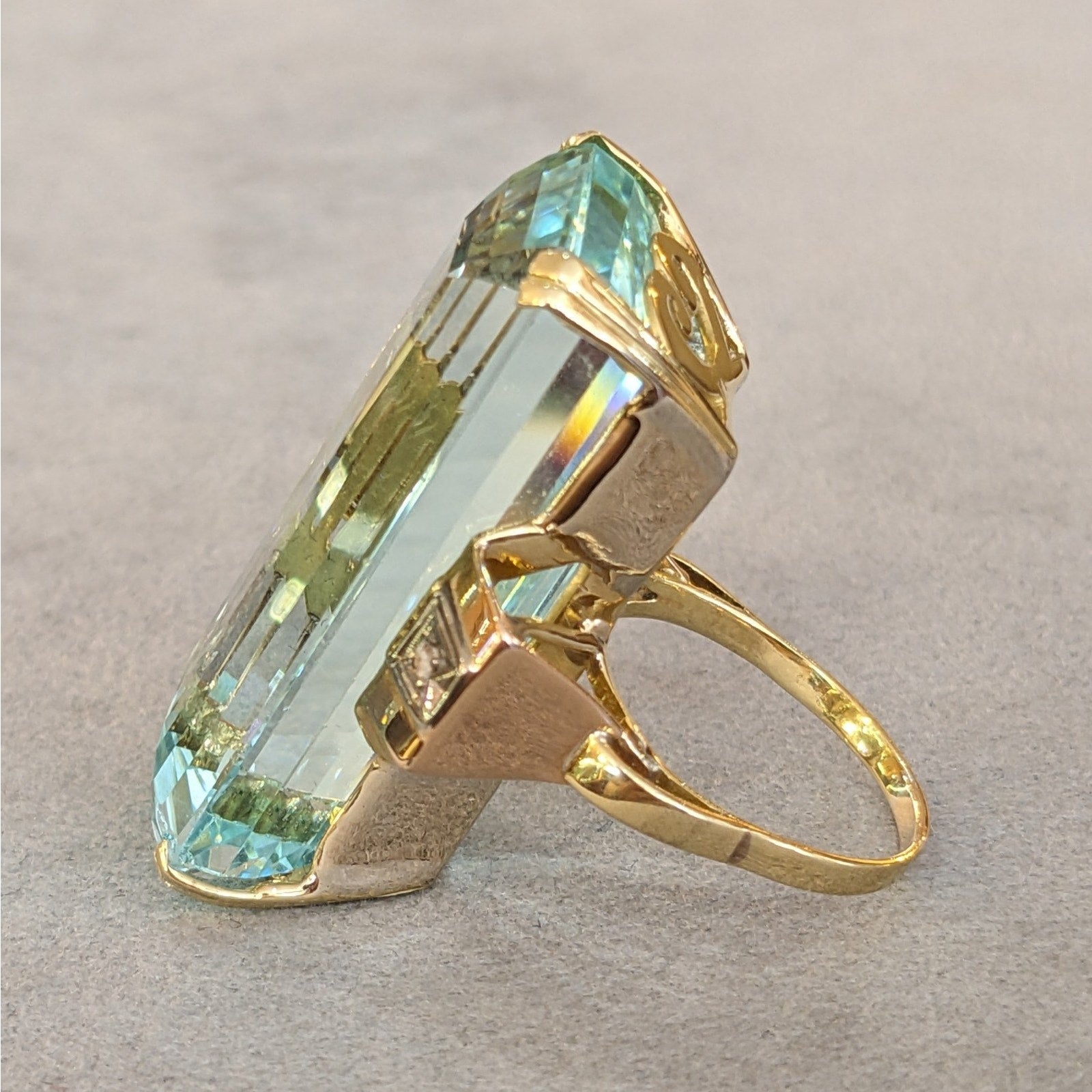 66.92 ct Elongated Aquamarine in Retro ring setting 18k and 14k Gold
