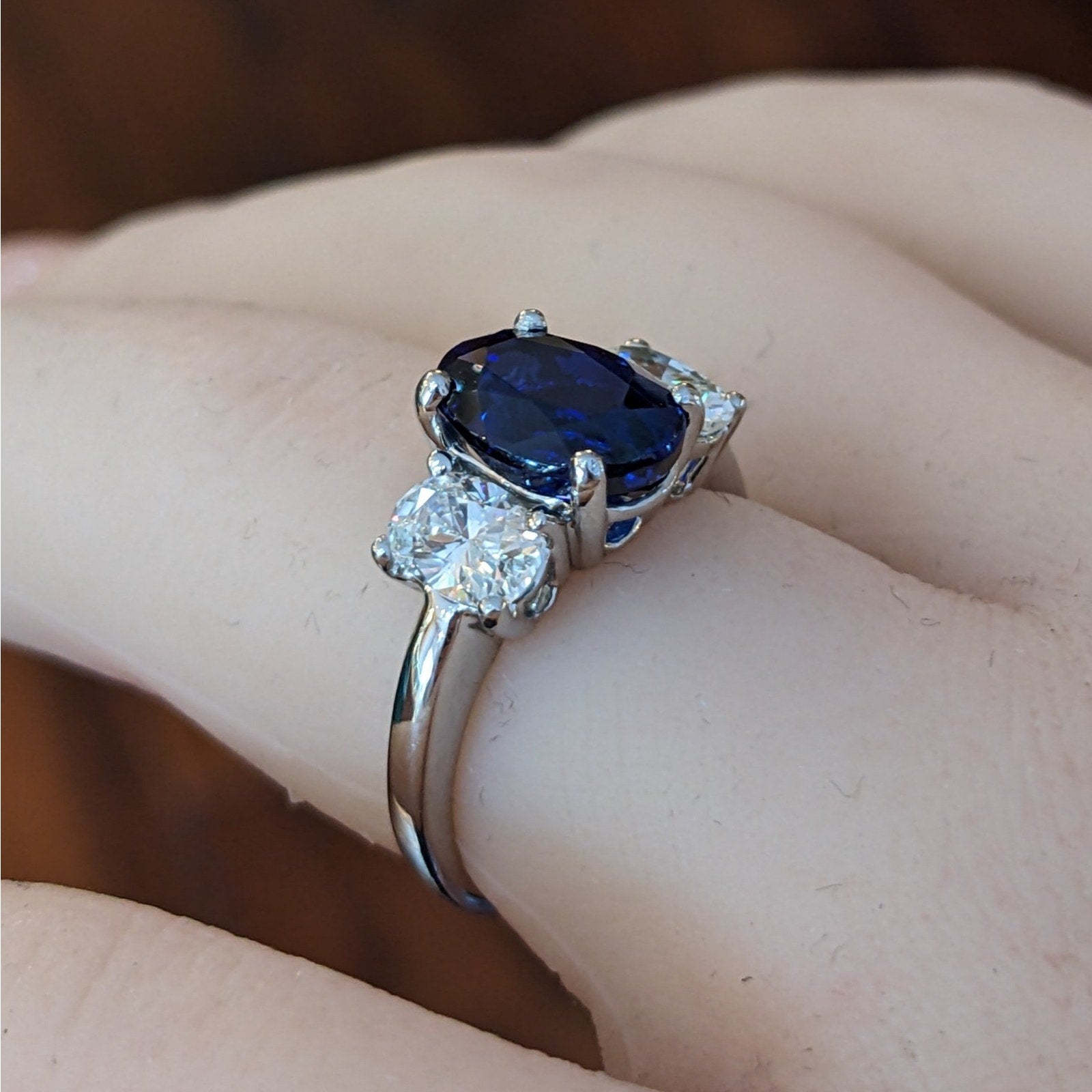 GIA Unheated Sapphire and Diamond Three Stone Ring in Platinum