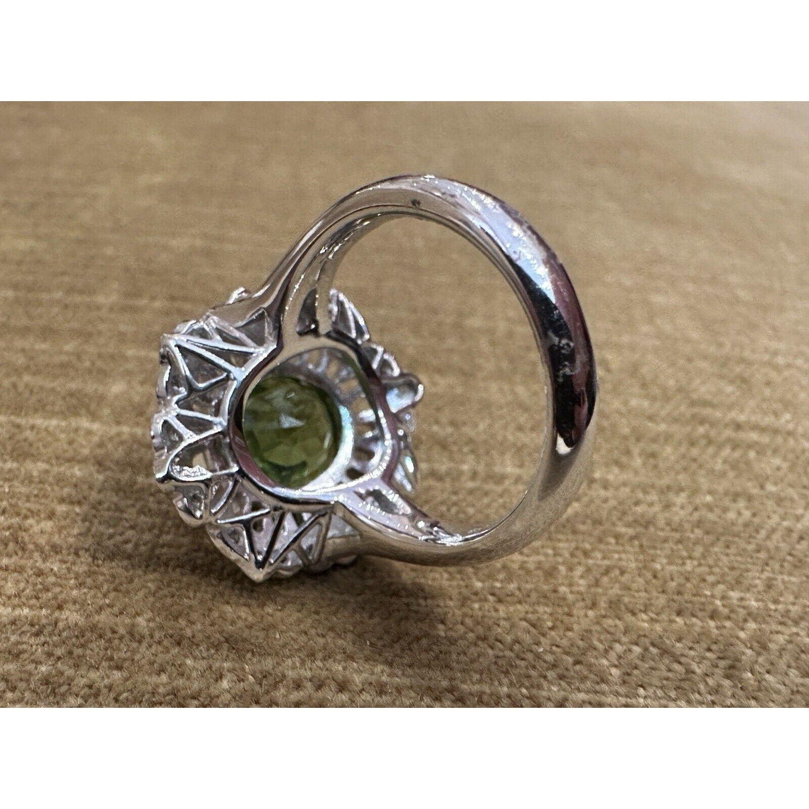 Oval Peridot 7.39 ct and Diamond Cocktail Ring in Platinum