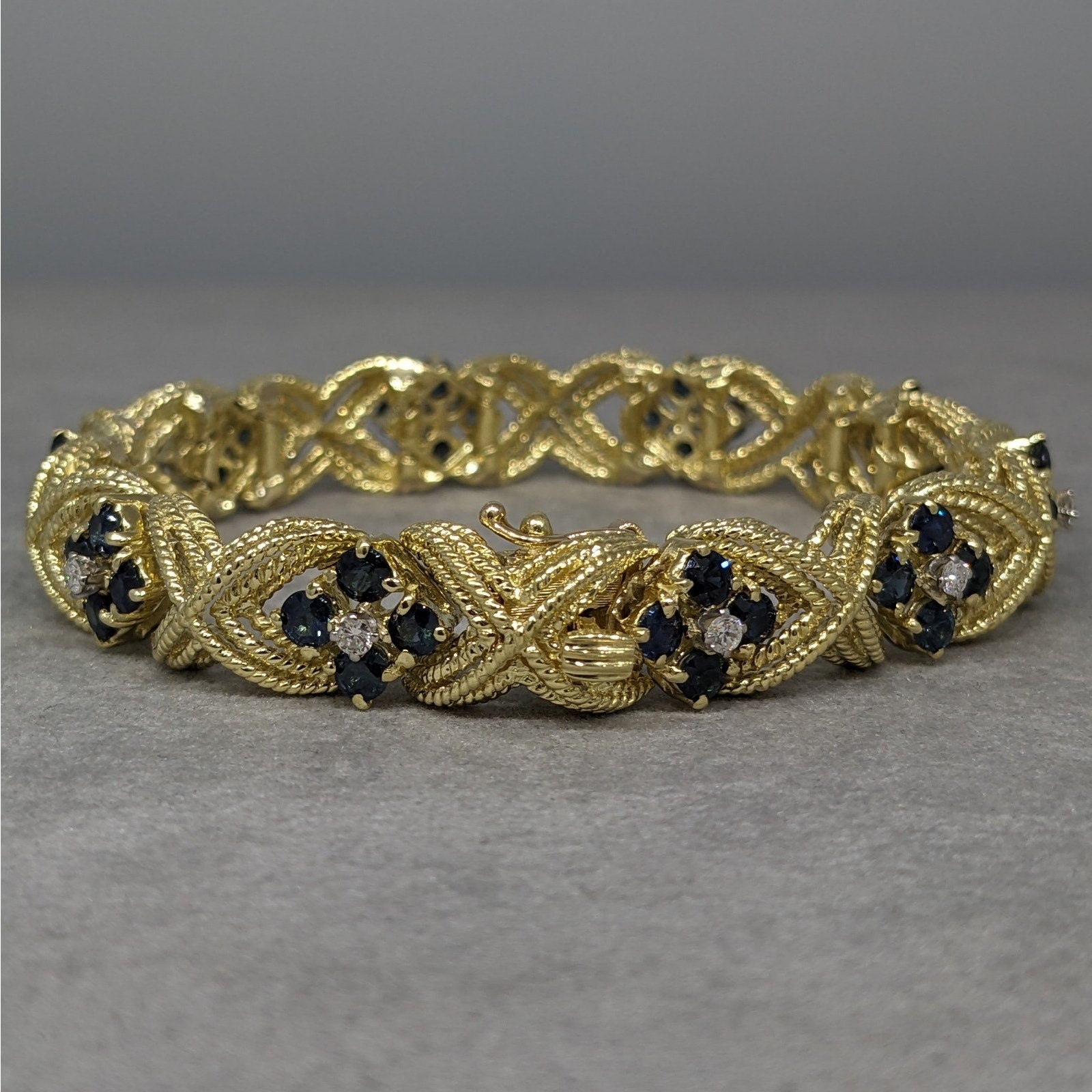 La Triomphe Sapphire and Diamond "X" Bracelet in 18k Yellow Gold
