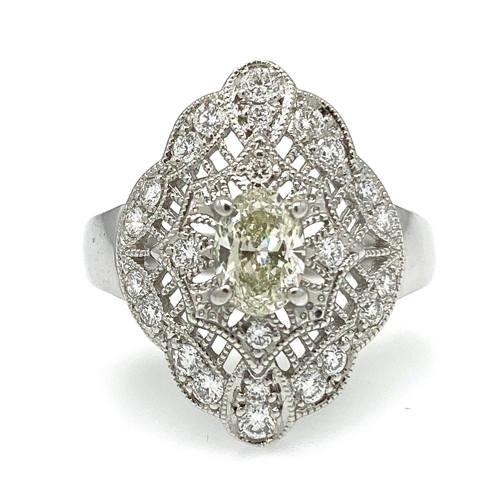 Oval Diamond Navette Shaped Filigree Ring in Platinum