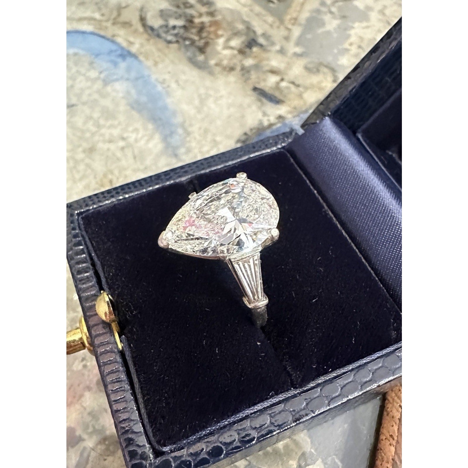 GIA 5.01 carat H-SI1 Pear Shape Diamond Three-Stone Ring in Platinum