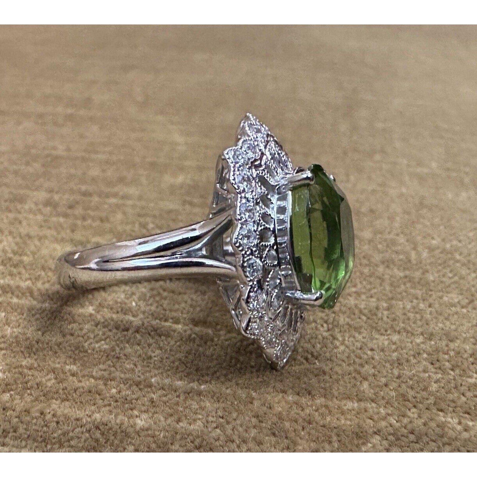 Oval Peridot 7.39 ct and Diamond Cocktail Ring in Platinum
