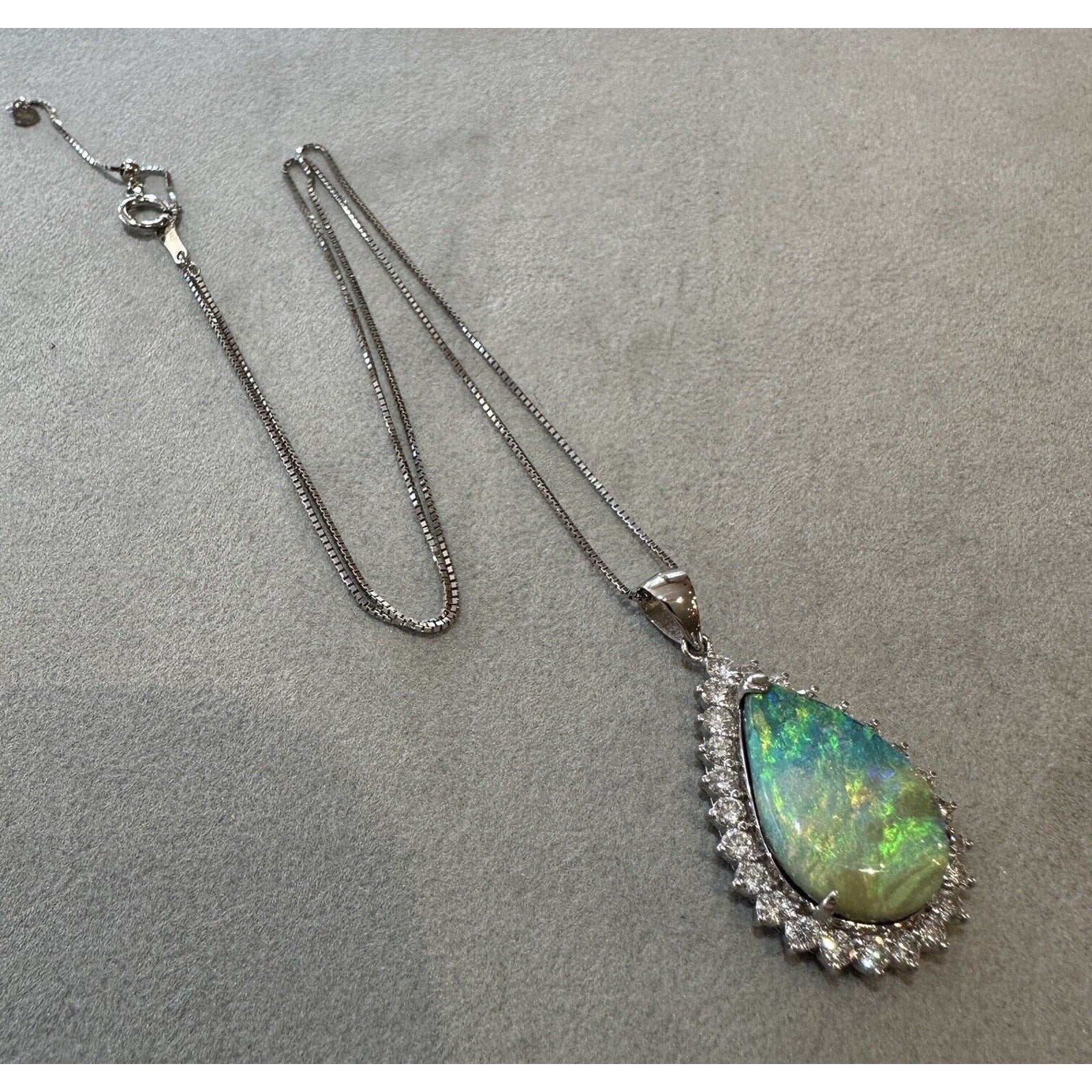 Pear-shaped Boulder Opal and Diamond Pendant Necklace in Platinum
