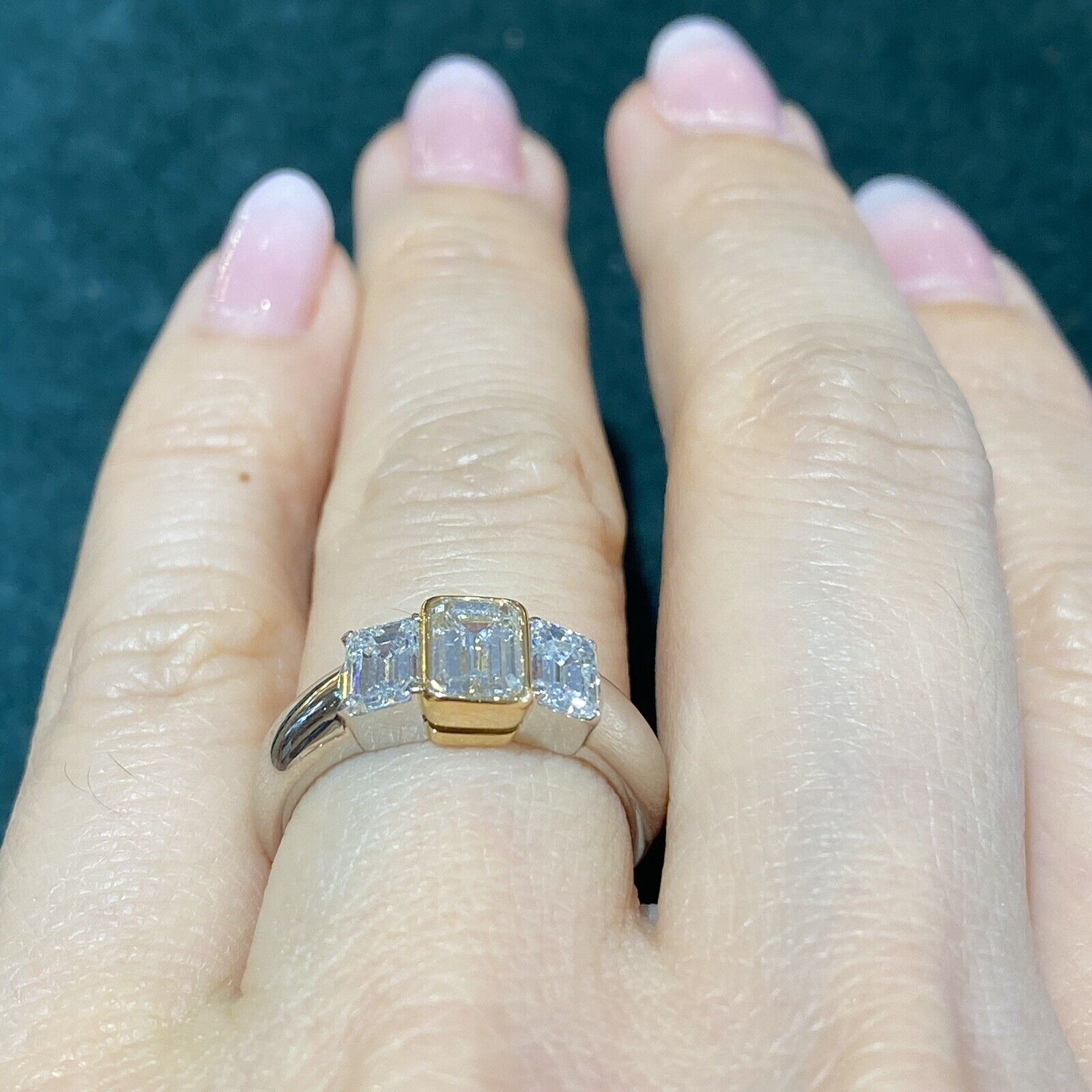 Three Stone Emerald Cut Diamond Ring in Platinum /18k Yellow Gold