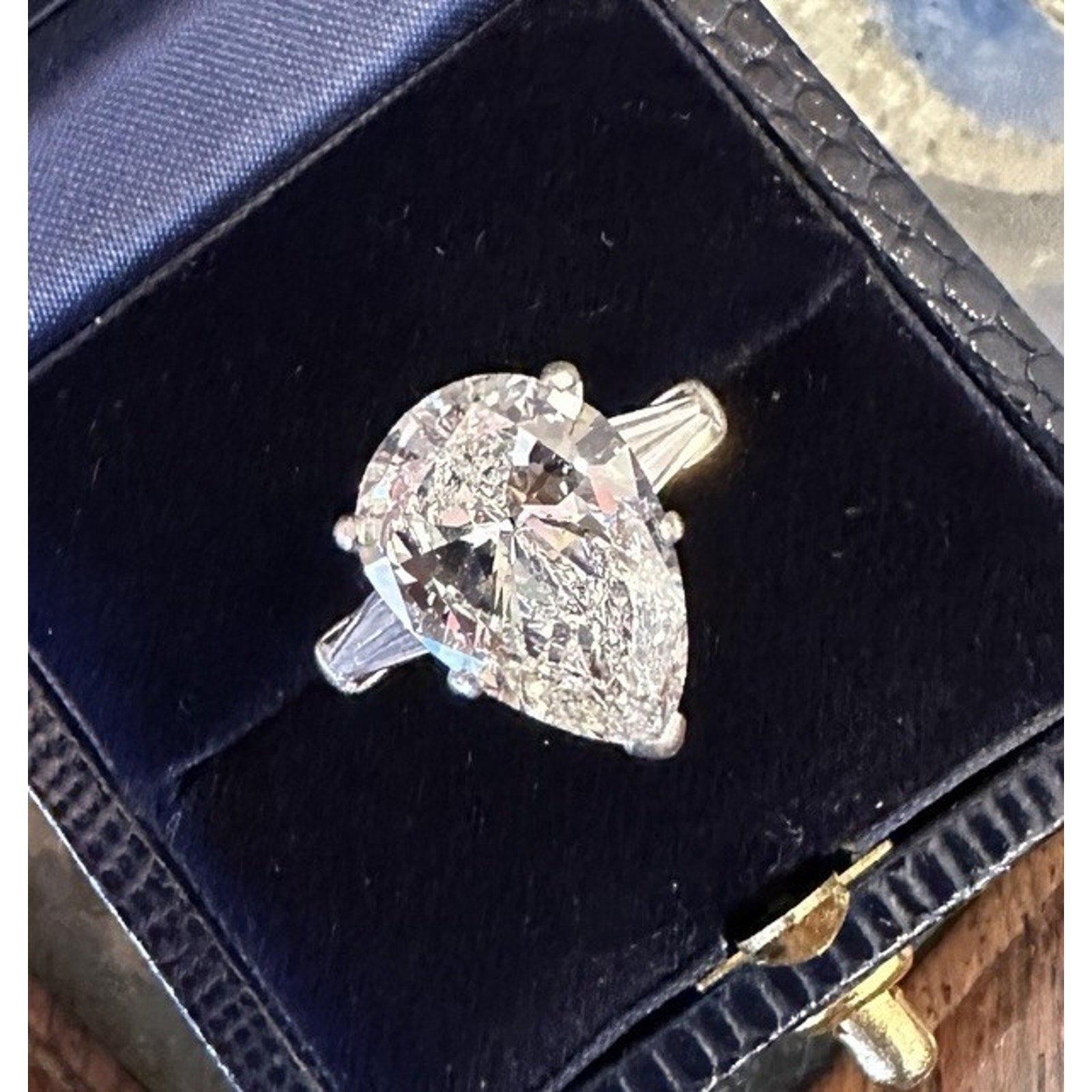GIA 5.01 carat H-SI1 Pear Shape Diamond Three-Stone Ring in Platinum
