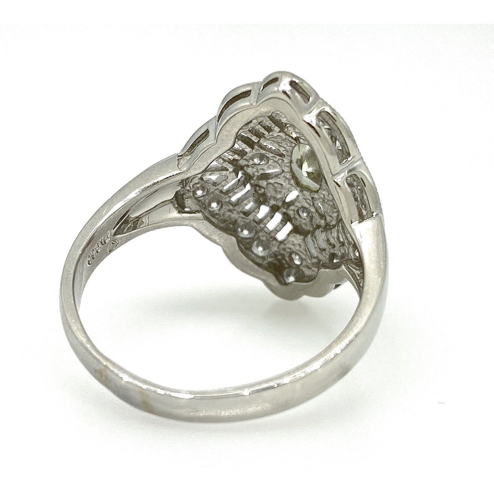 Oval Diamond Navette Shaped Filigree Ring in Platinum