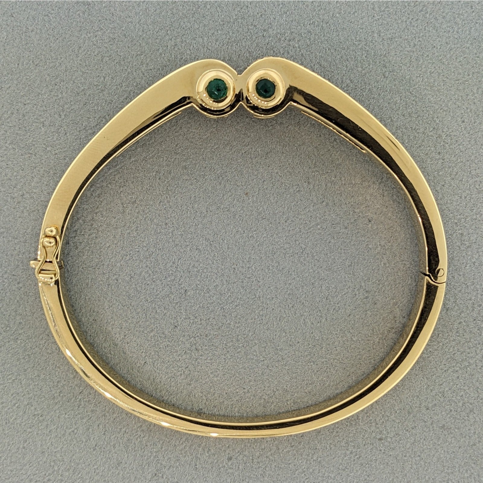 Emerald and Diamond Hinged Bangle Bracelet in 18k Yellow Gold