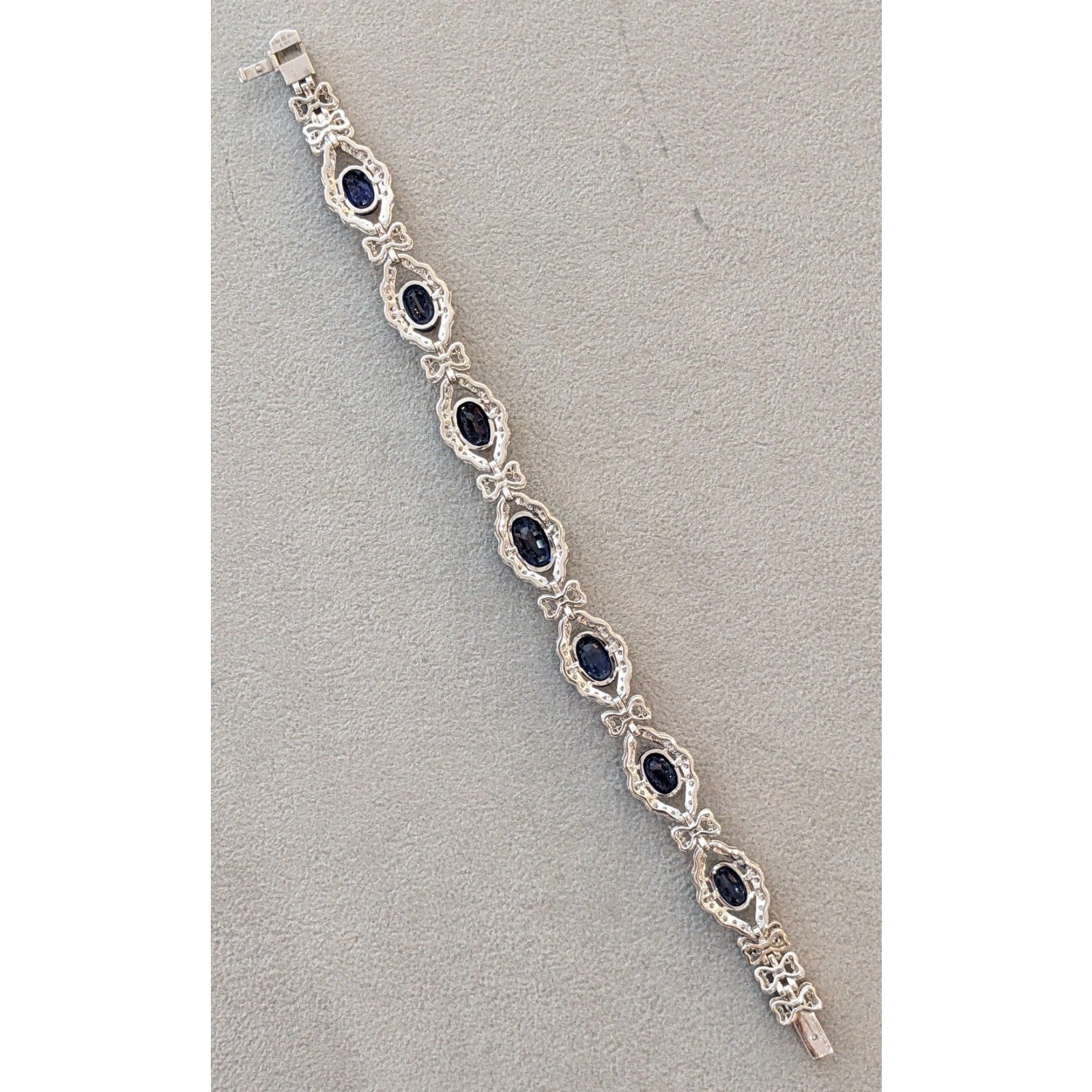 Blue Sapphire and Diamond Station Bracelet with Bows in Platinum