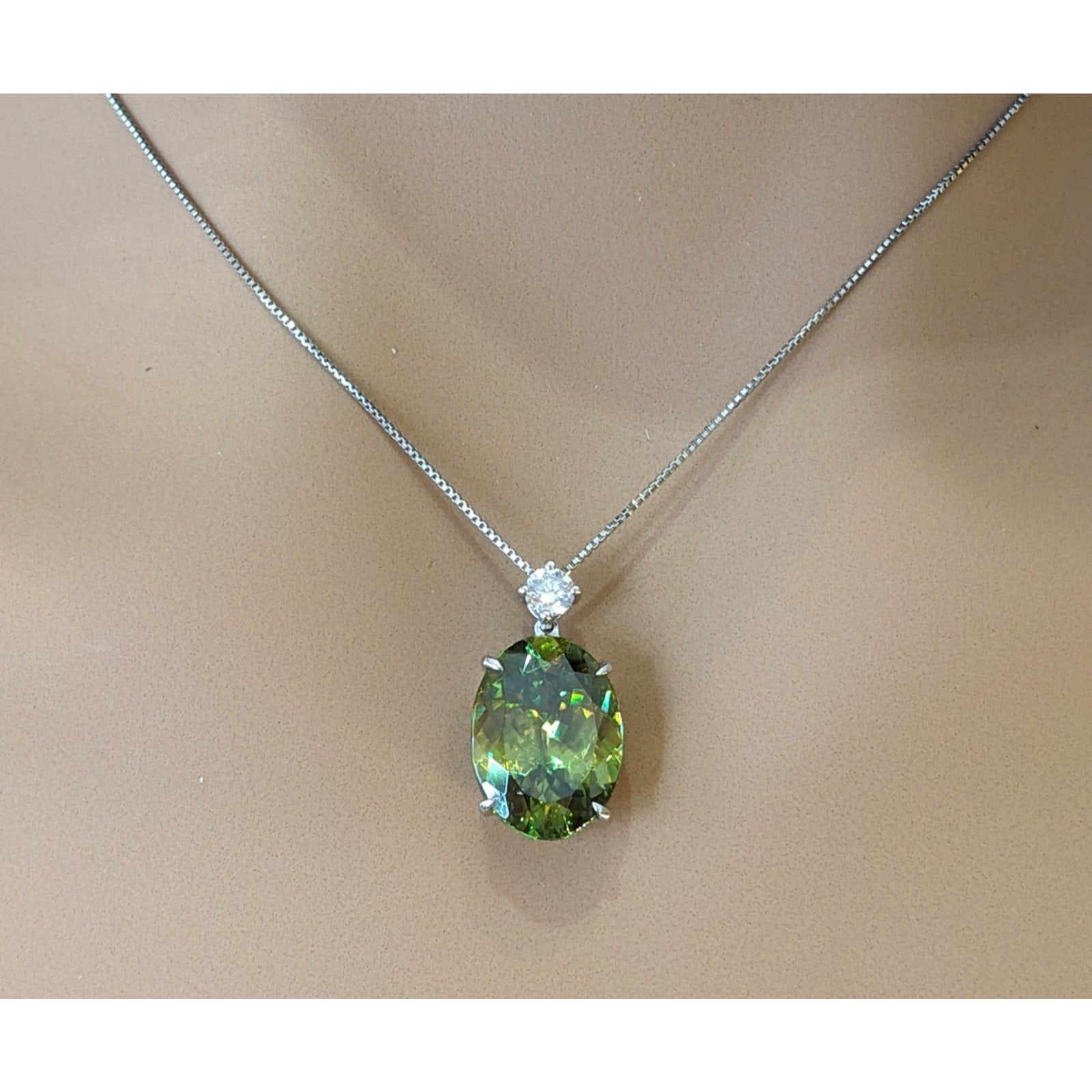 5.69 ct Oval Sphene and Round Diamond Pendant Necklace in Platinum
