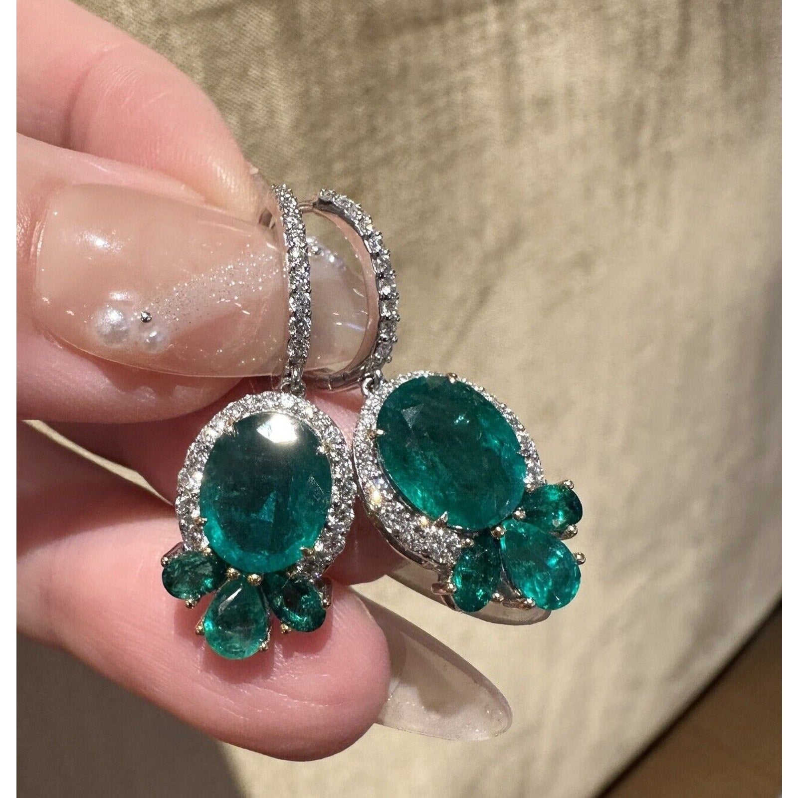 Oval Emerald and Diamond Drop Earrings in 18k White Gold