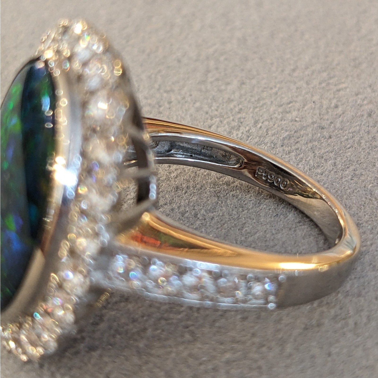 6.31 cts. Natural Black Opal and Diamond Halo Ring in Platinum