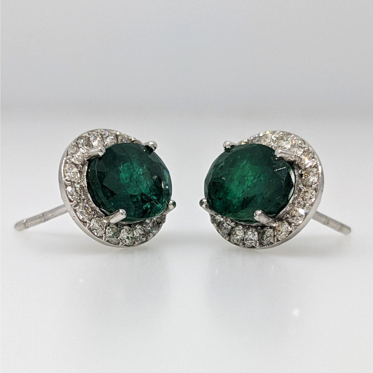 Natural Emerald Oval Stud Earrings with Diamonds in 14k White Gold