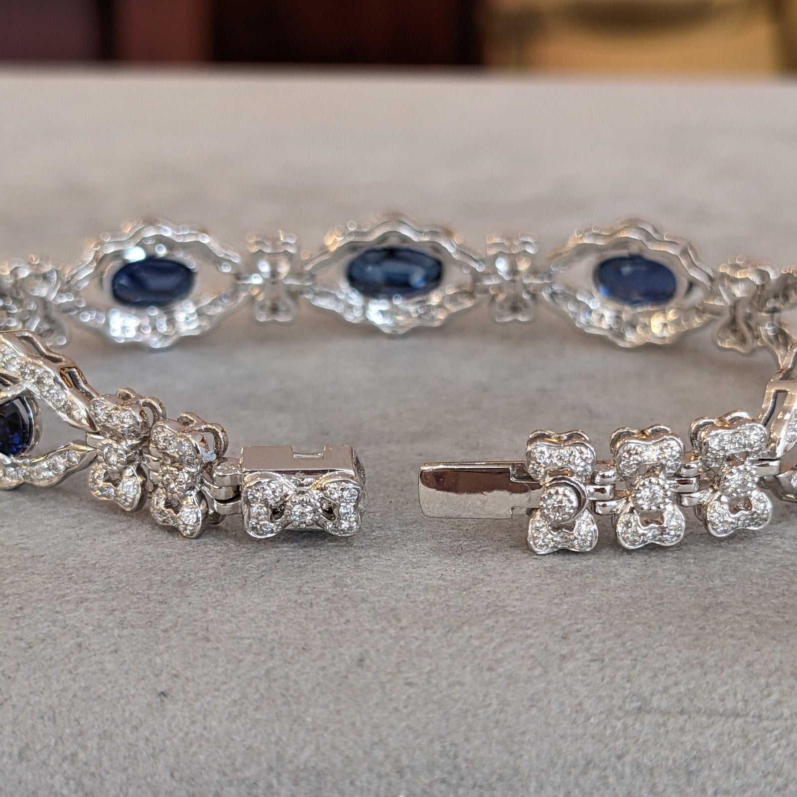 Blue Sapphire and Diamond Station Bracelet with Bows in Platinum