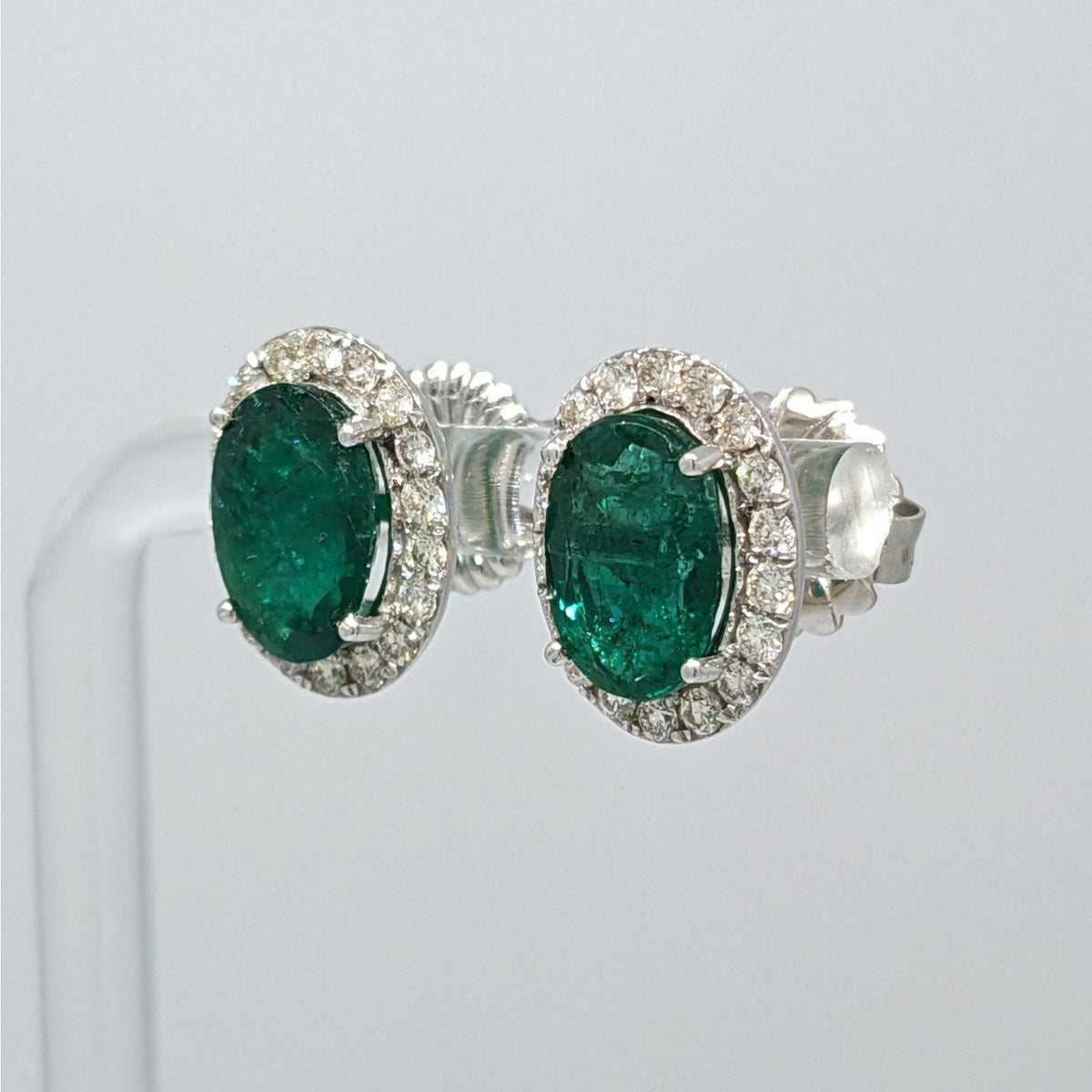 Natural Emerald Oval Stud Earrings with Diamonds in 14k White Gold