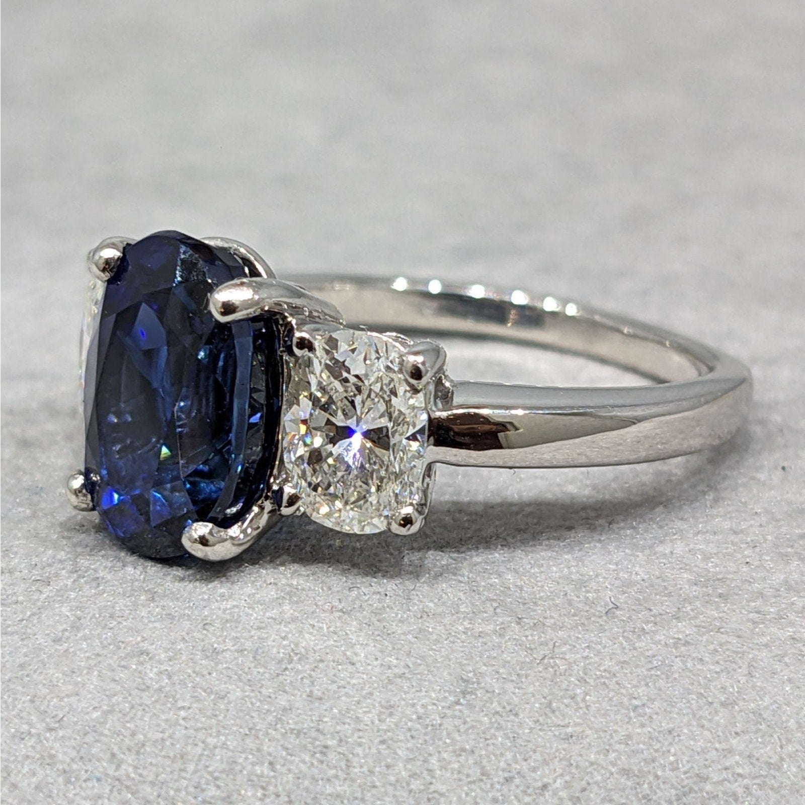 GIA Unheated Sapphire and Diamond Three Stone Ring in Platinum