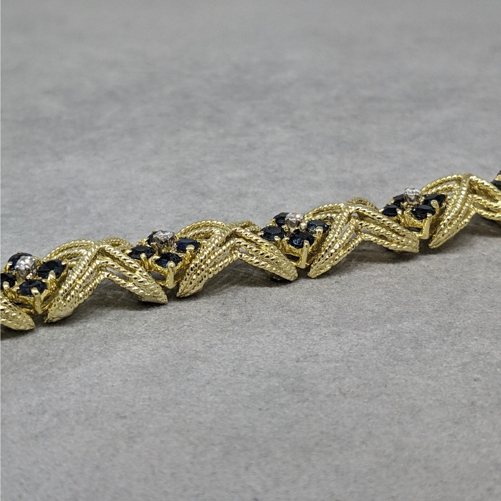 La Triomphe Sapphire and Diamond "X" Bracelet in 18k Yellow Gold