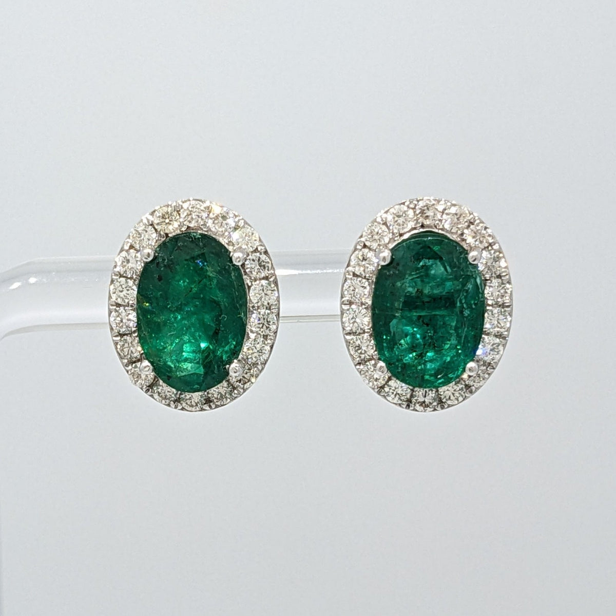 Natural Emerald Oval Stud Earrings with Diamonds in 14k White Gold