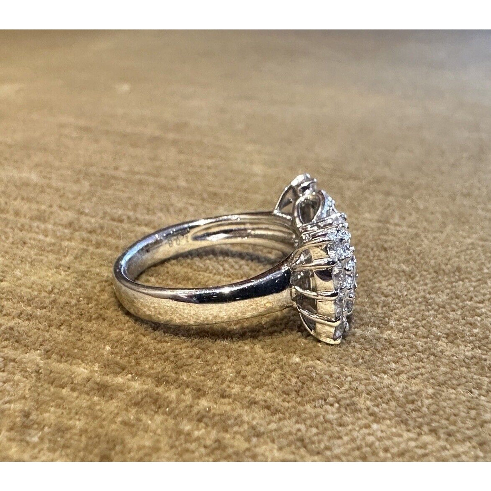 Oval Diamond Center Bow Ring in 18k White Gold