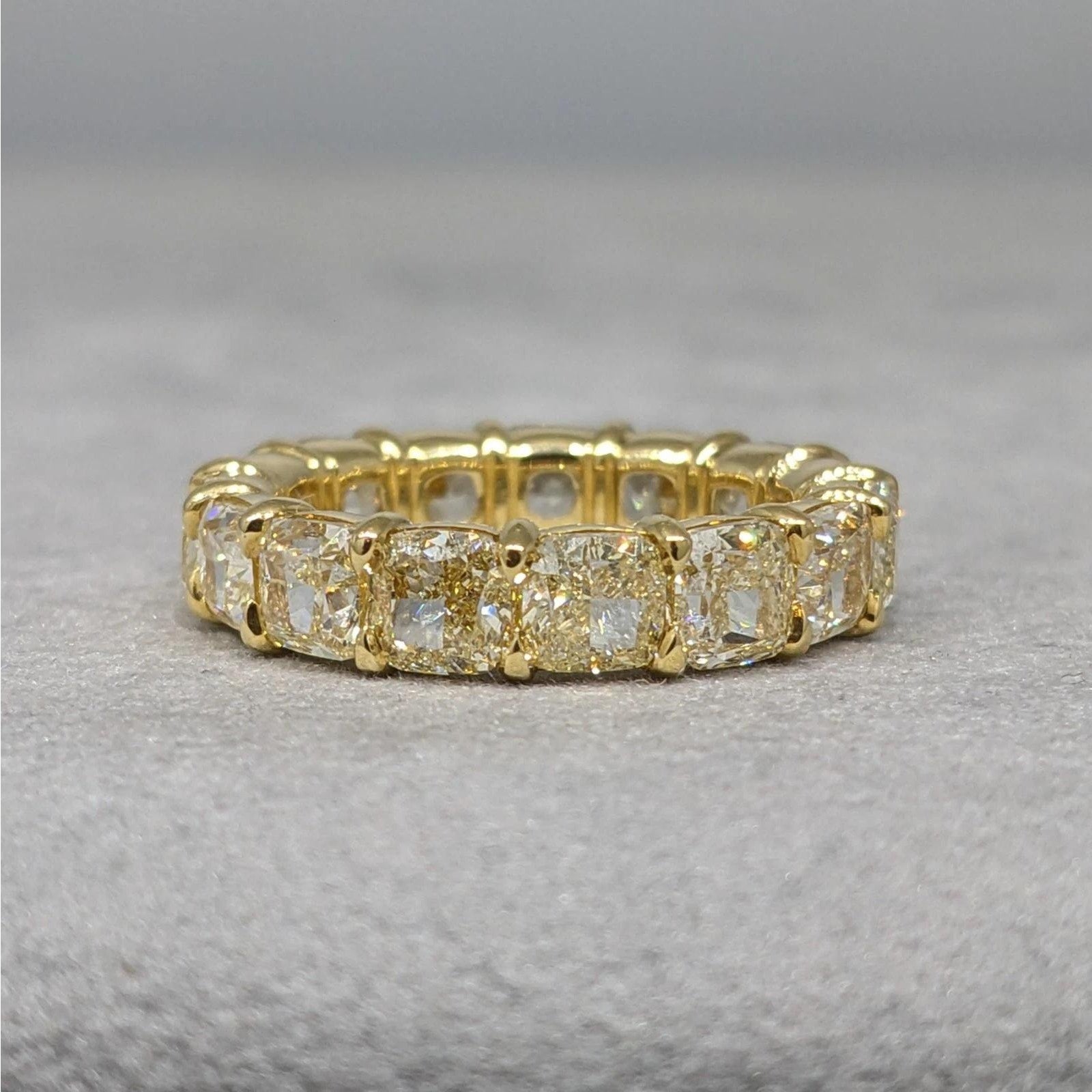 Light Yellow Cushion Diamond Eternity Ring 7.47cts in 18k Yellow Gold