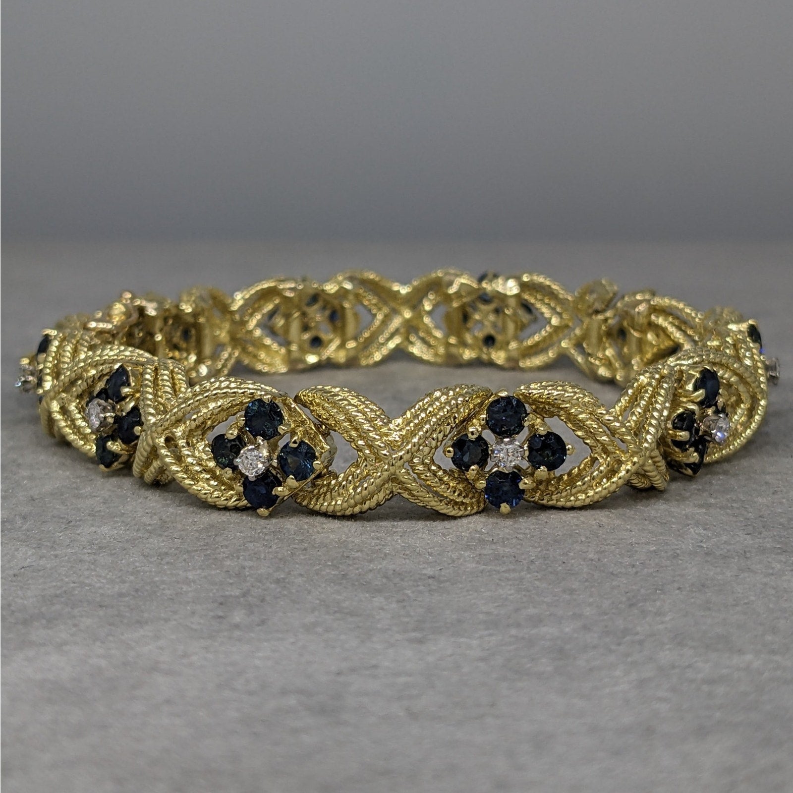 La Triomphe Sapphire and Diamond "X" Bracelet in 18k Yellow Gold