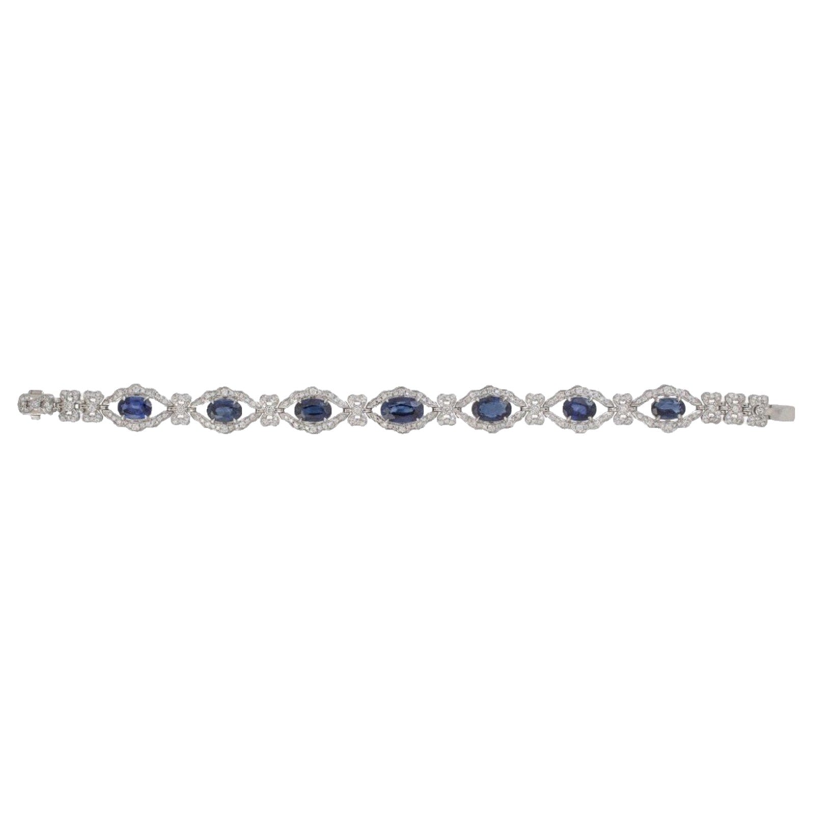Blue Sapphire and Diamond Station Bracelet with Bows in Platinum