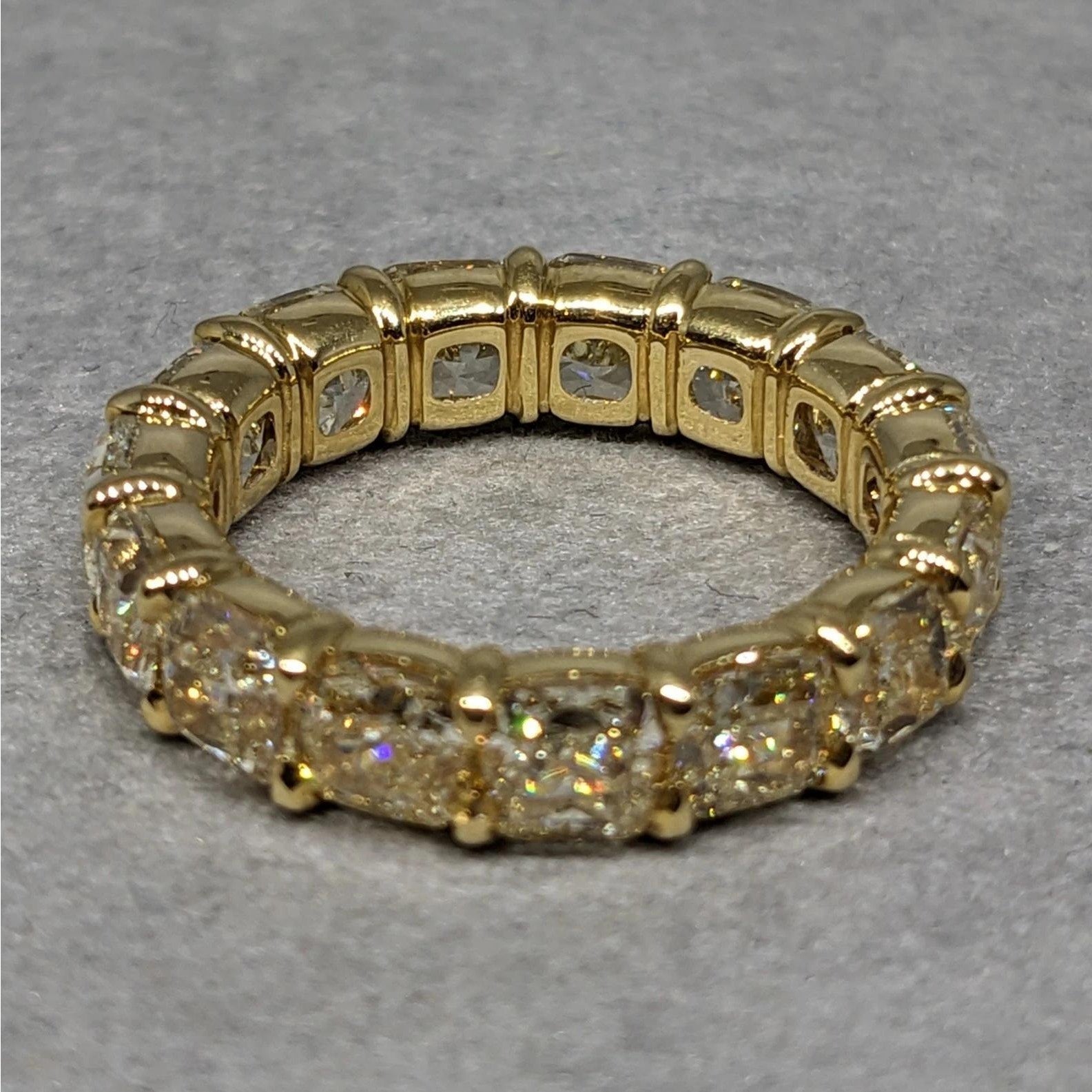 Light Yellow Cushion Diamond Eternity Ring 7.47cts in 18k Yellow Gold