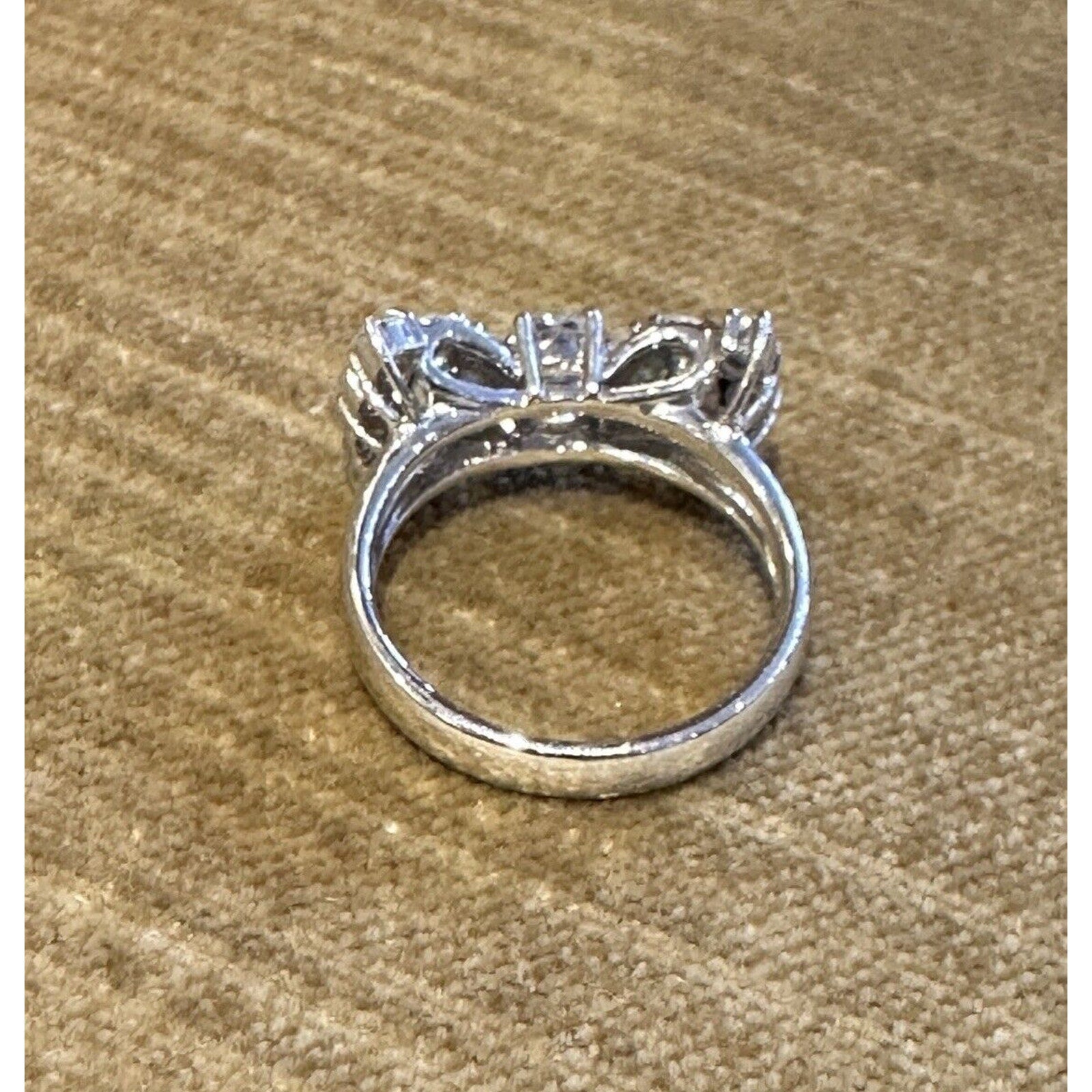 Oval Diamond Center Bow Ring in 18k White Gold
